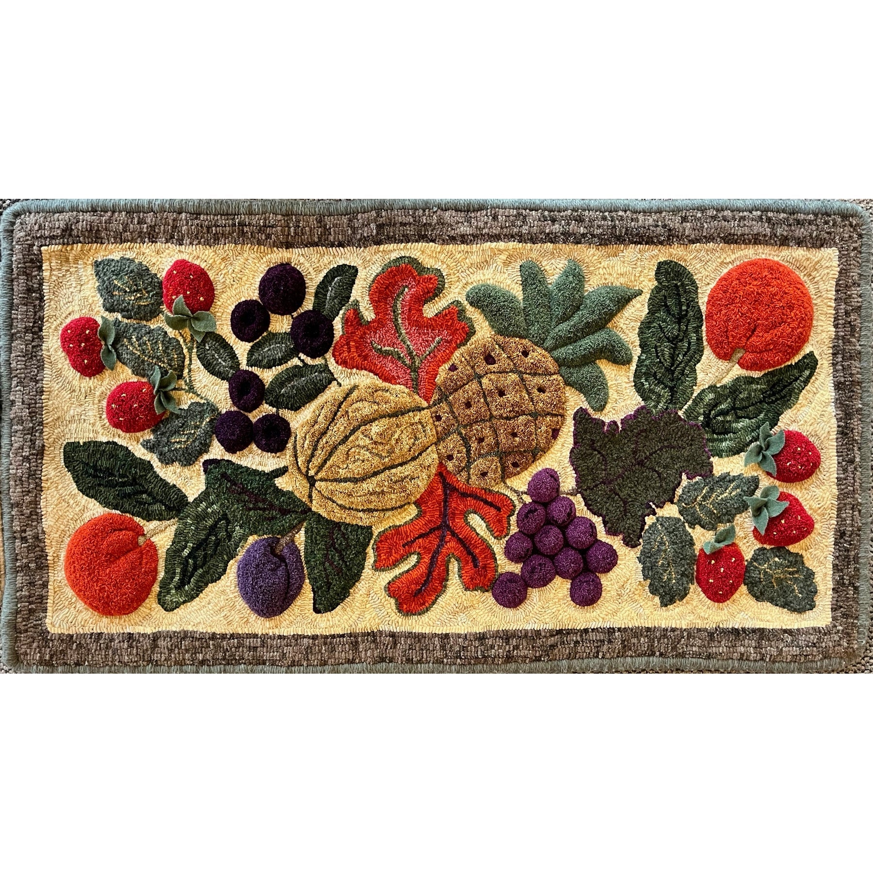 Primitive Fruit, rug hooked by Marianne Relka