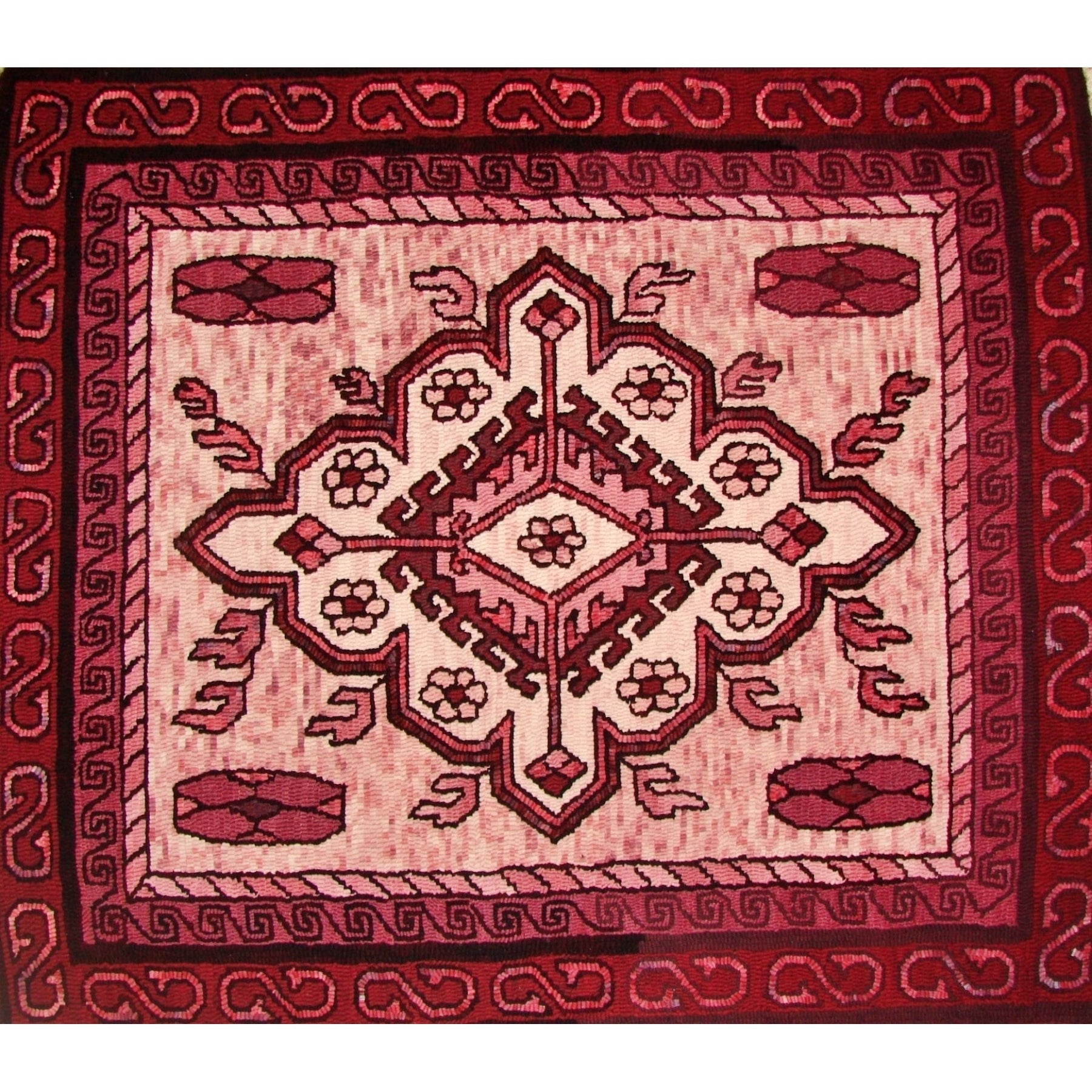 Soumac Single Medallion, rug hooked by Connie Bradley