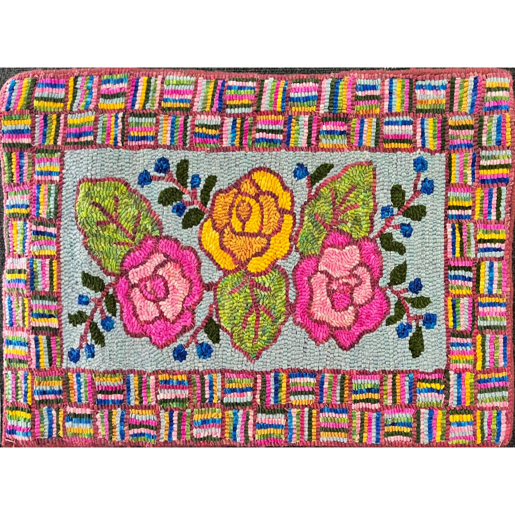 Three Rose Antique, rug hooked by Jayne Nevins