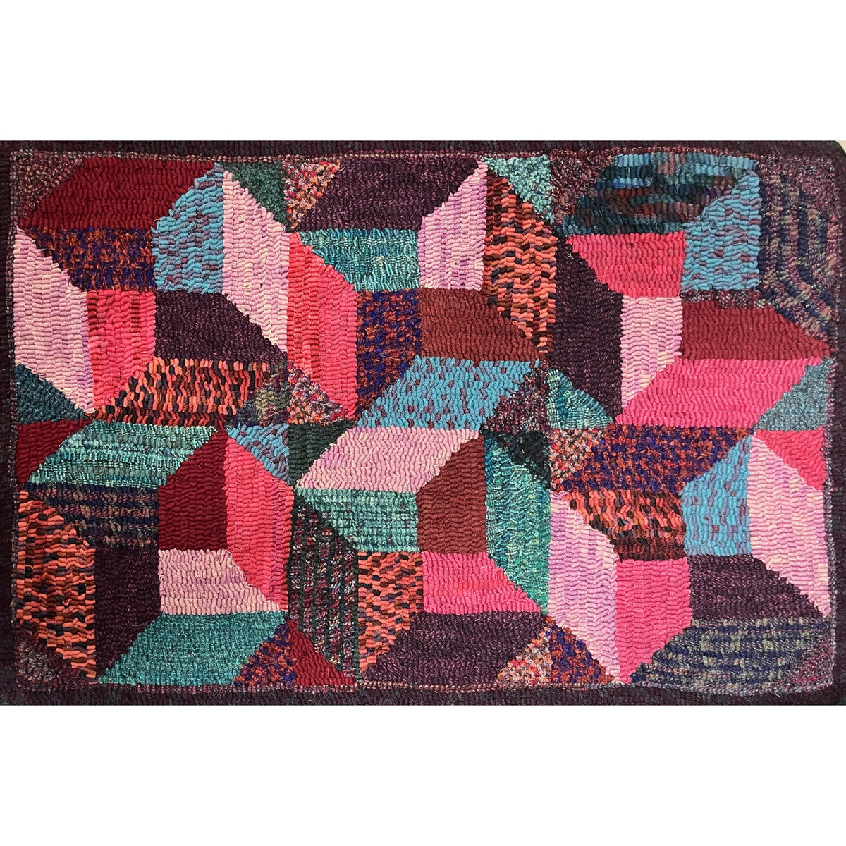 Double Take, rug hooked by Sandra Brown