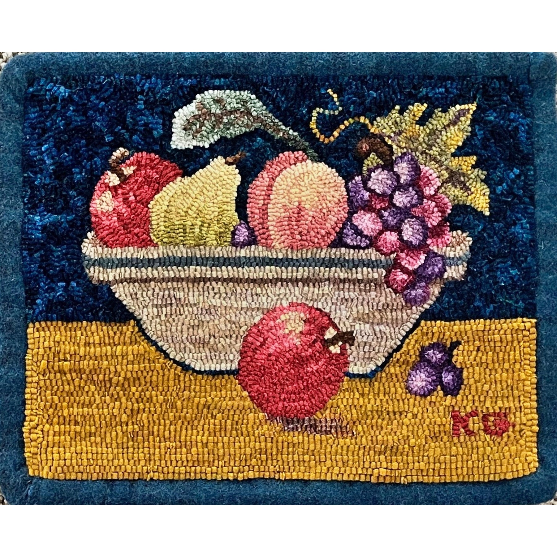 Compote, rug hooked by Kathryn Gould