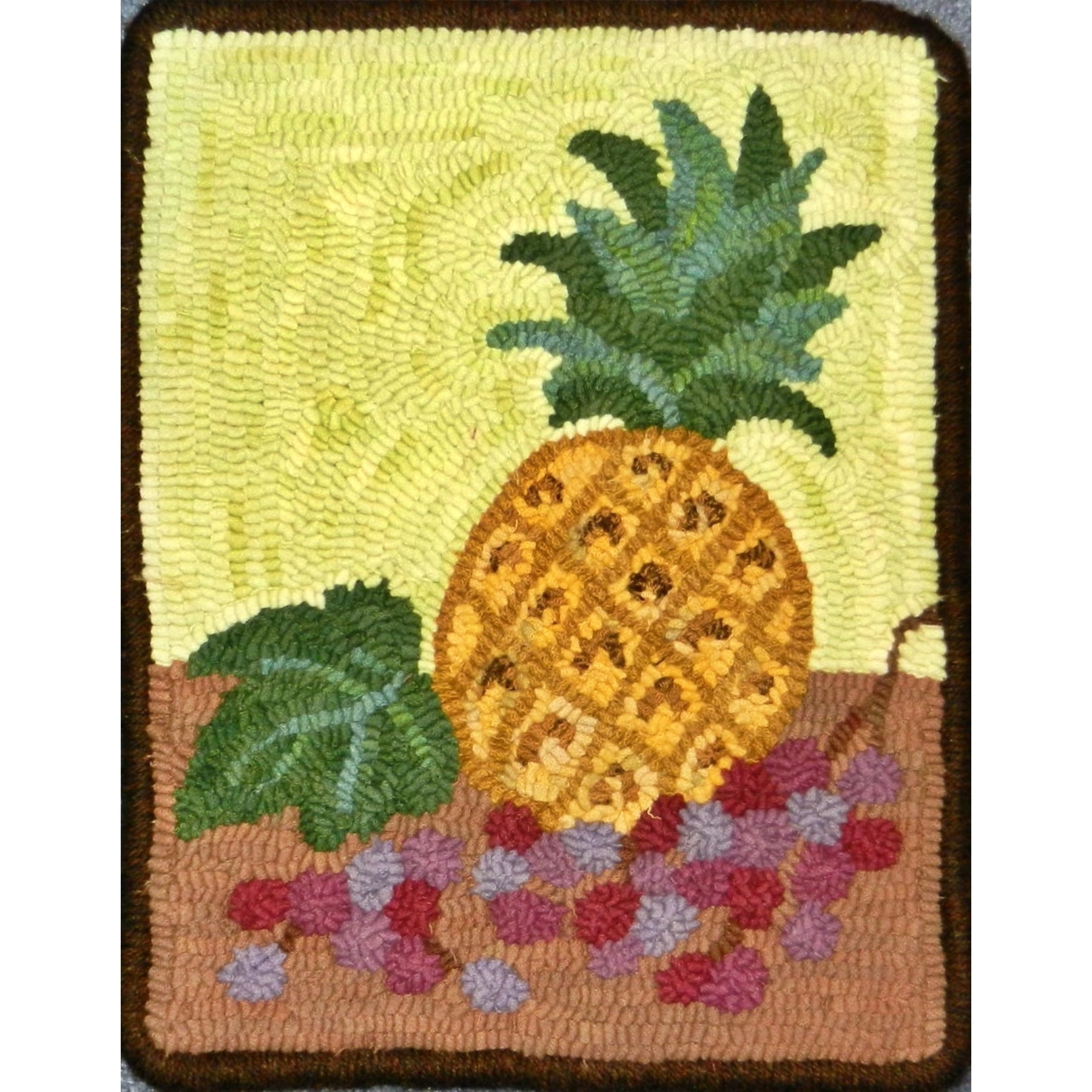 Pineapple Still Life, rug hooked by Carolyn Cooke