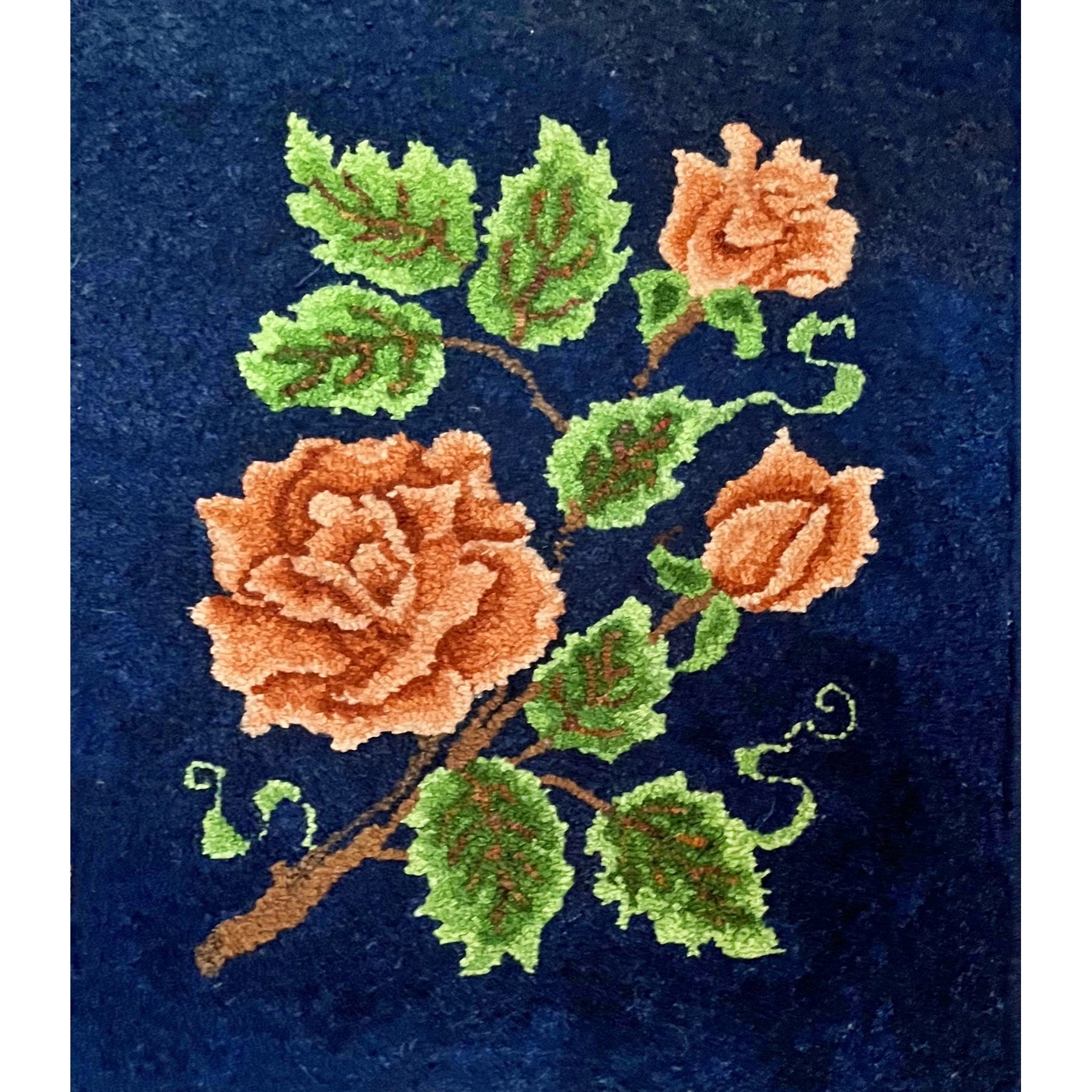 Roses, rug hooked by Lynn Tenney