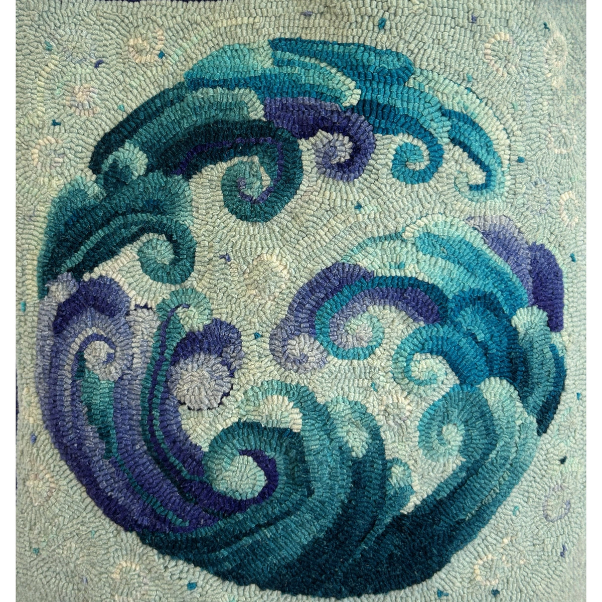 Crest, rug hooked by Charlene Cox