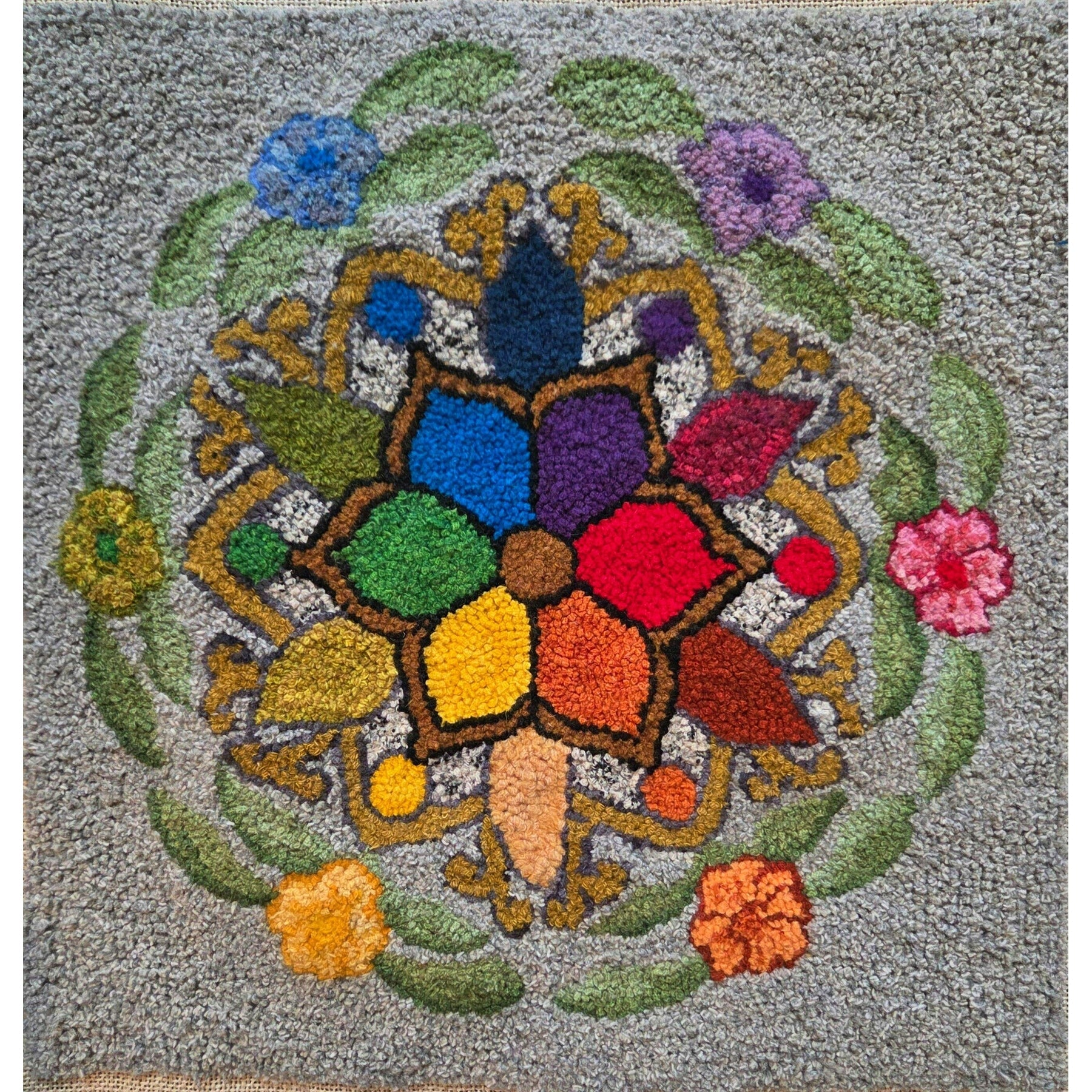 Color Mandala, rug hooked by Kathie Yancey