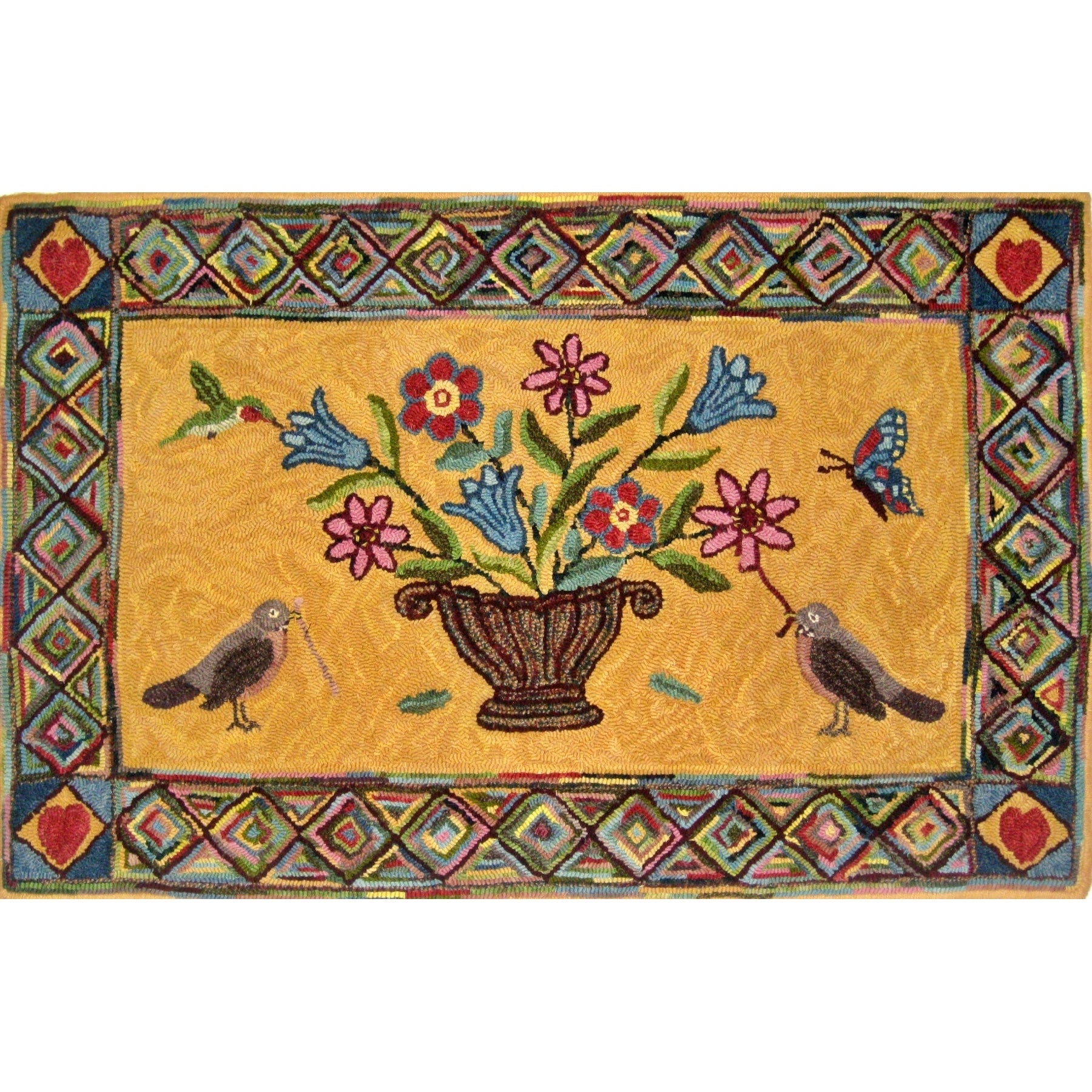 Reverse Hooking Robin, rug hooked by John Leonard