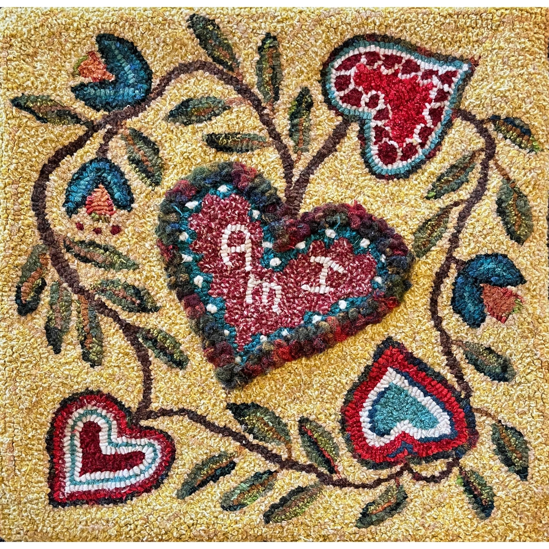 Hearts And Tulips, rug hooked by Melissa Pattacini