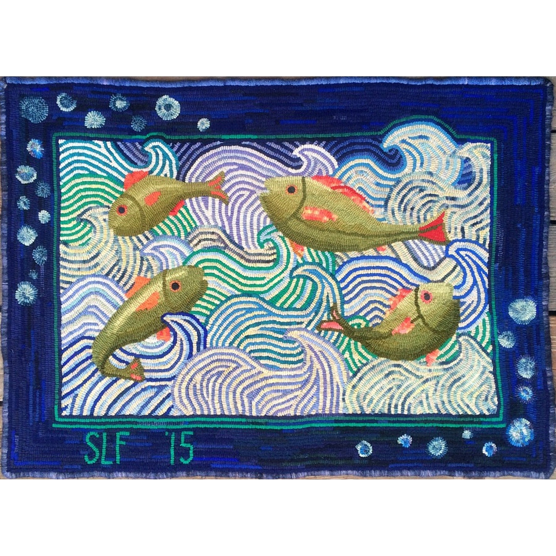 The Fish And The Wave, rug hooked by Suzan Farrens