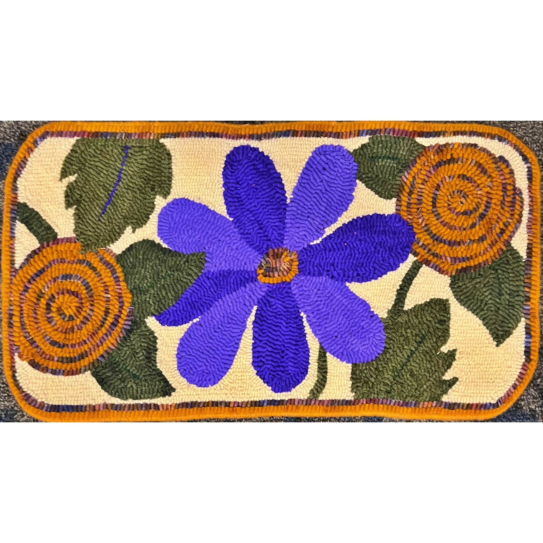 Spring Garden Bench, rug hooked by Kathryn Kovaric