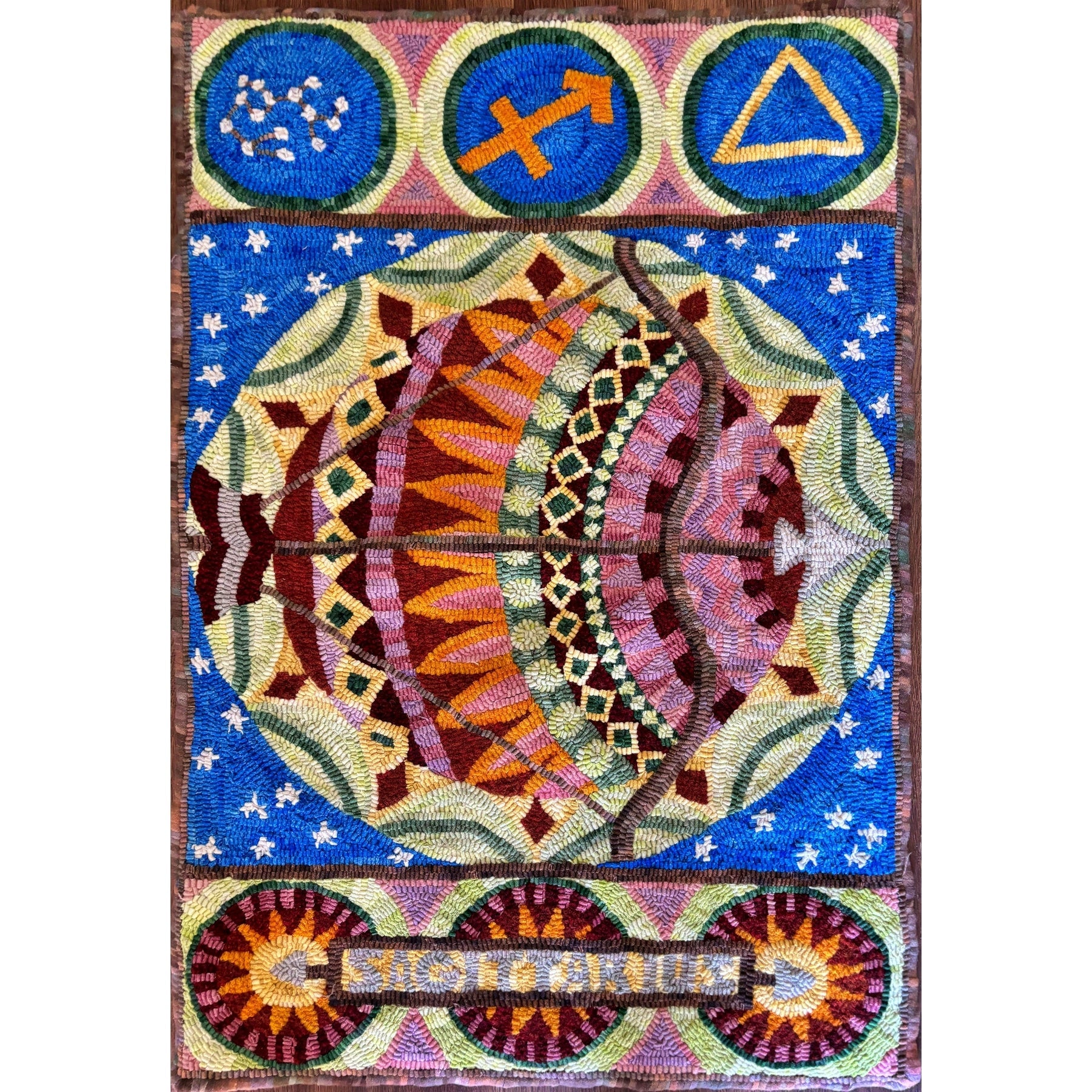 Sagittarius, rug hooked by Dawn Gray