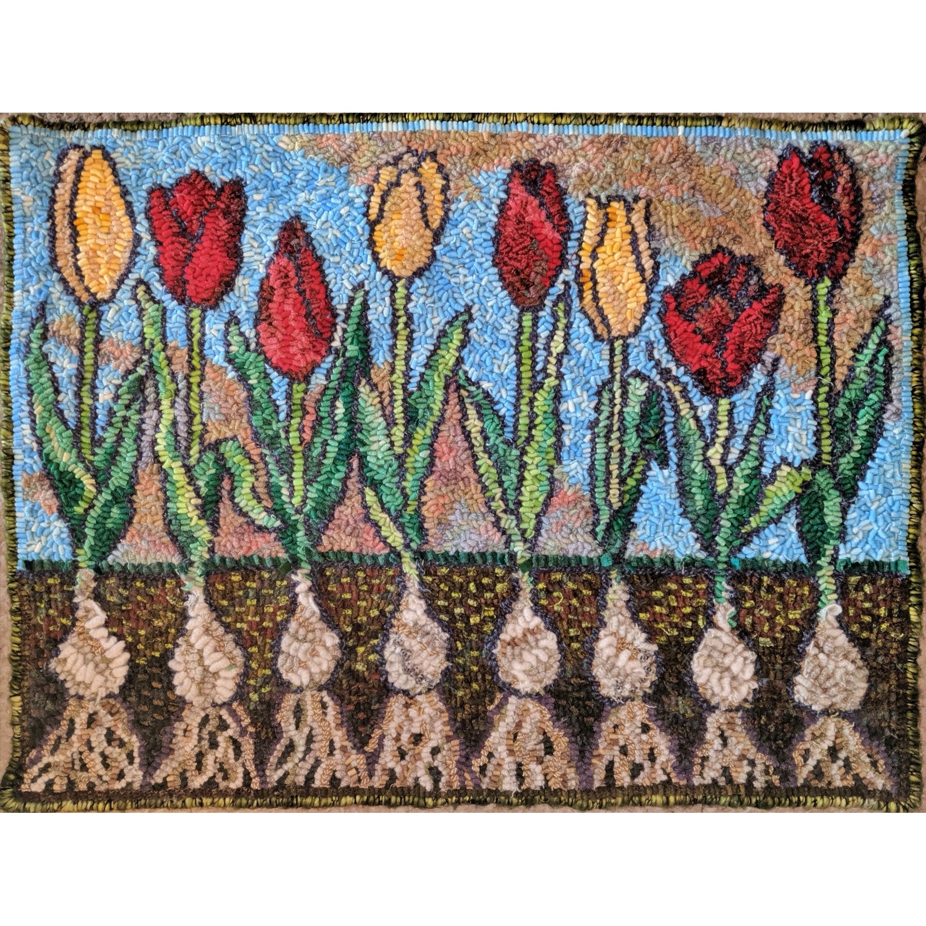 Renewal, rug hooked by Mary Gordon