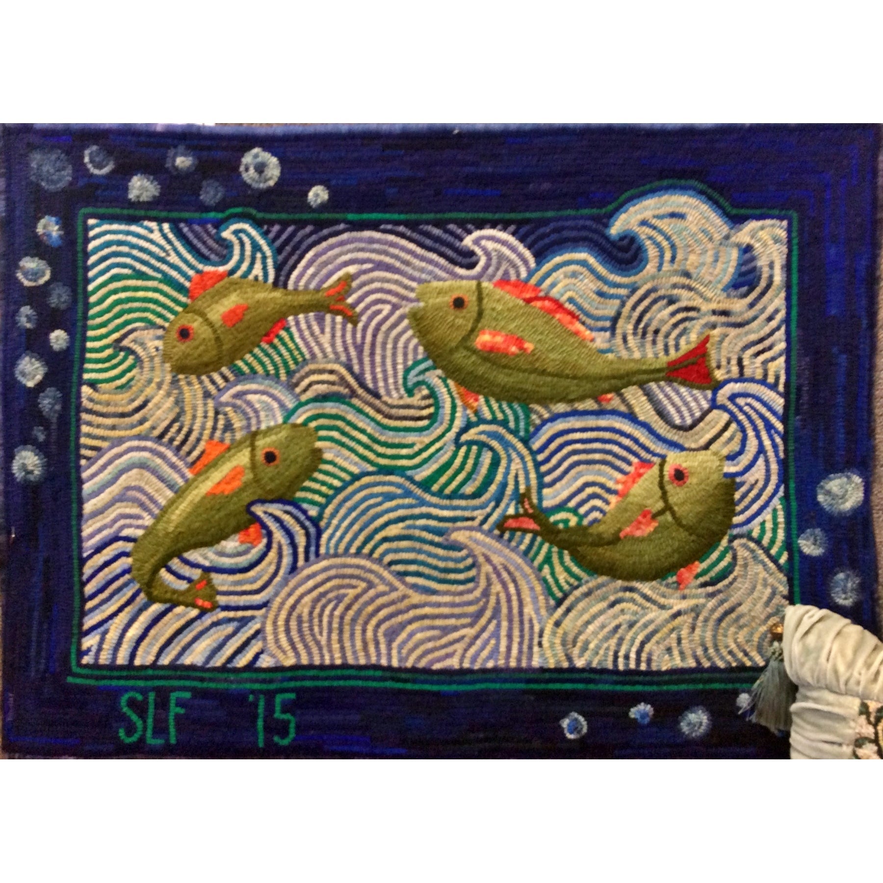 The Fish And The Wave, rug hooked by Suzanne Farrens