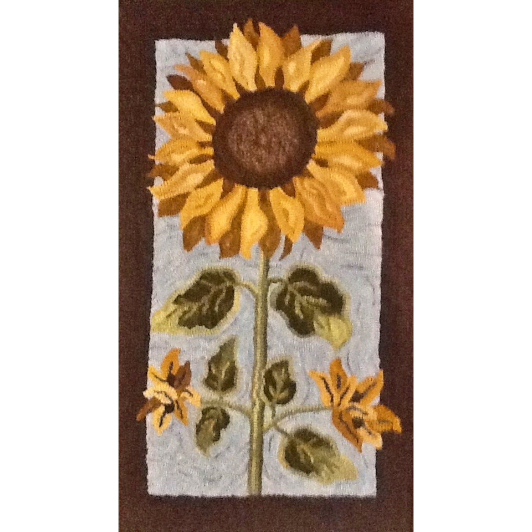 Sunflower, rug hooked by Louise Hulbert