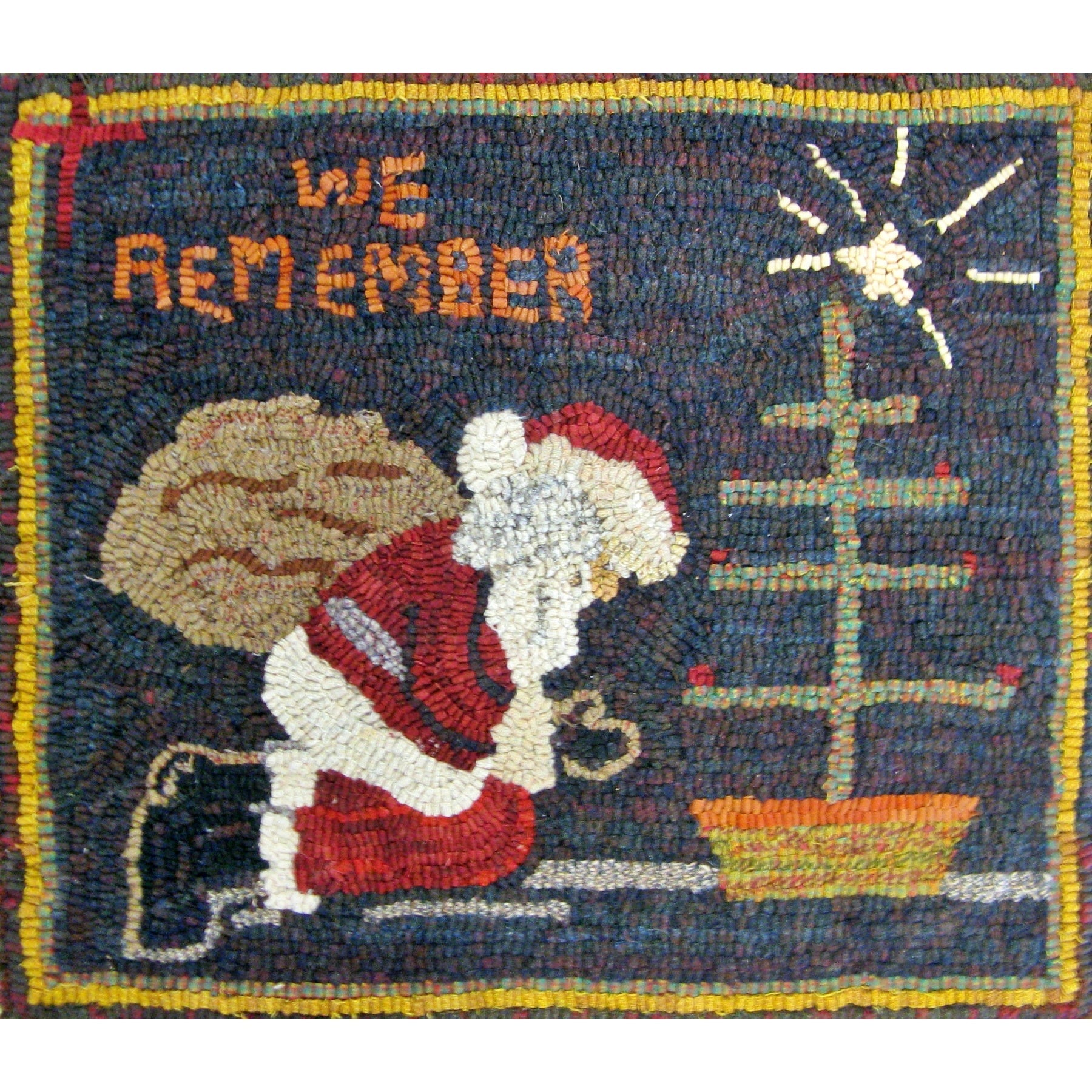 Praying Santa, rug hooked by Sylvia Titsworth