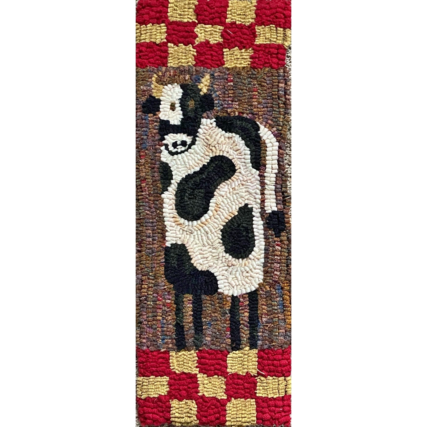 Moo, rug hooked by Laura Rose