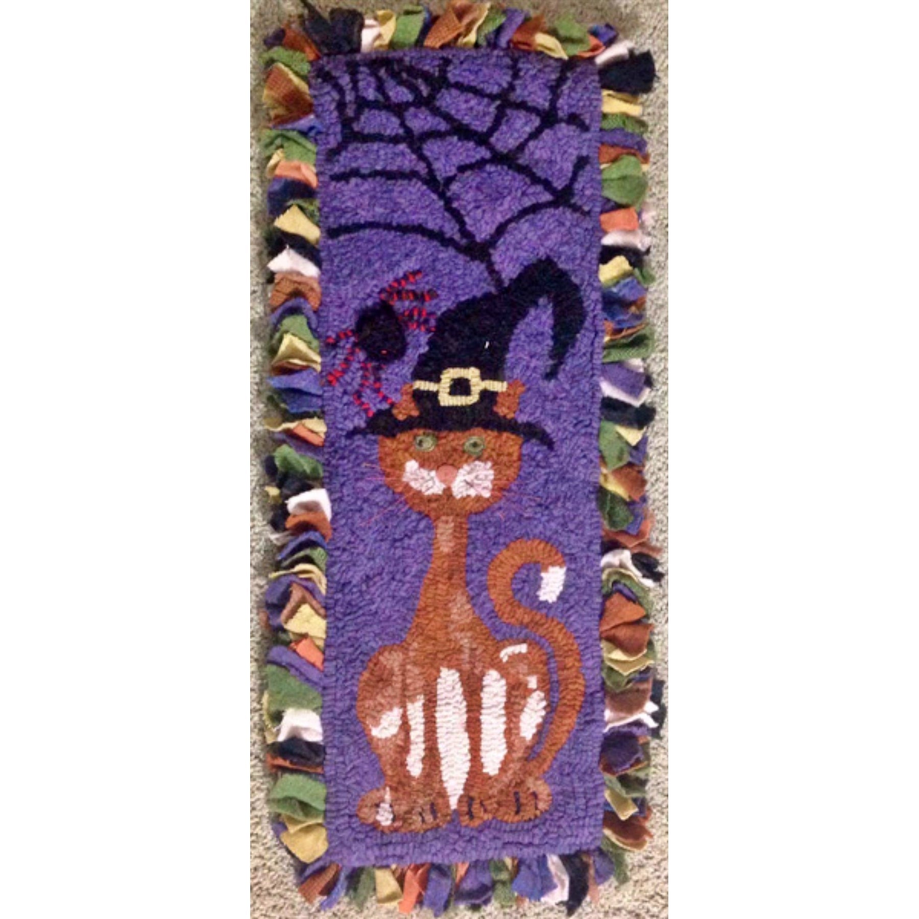 Spooky Cat, rug hooked by Marj Miller