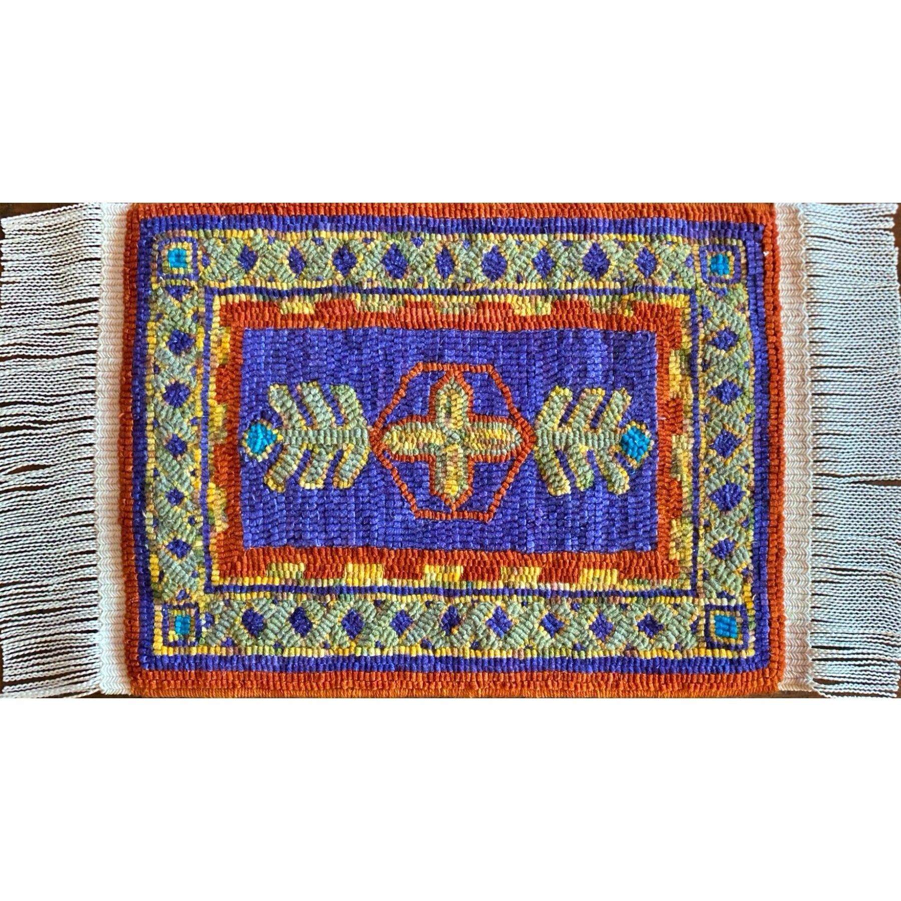 Afshar, rug hooked by Sandy Myers