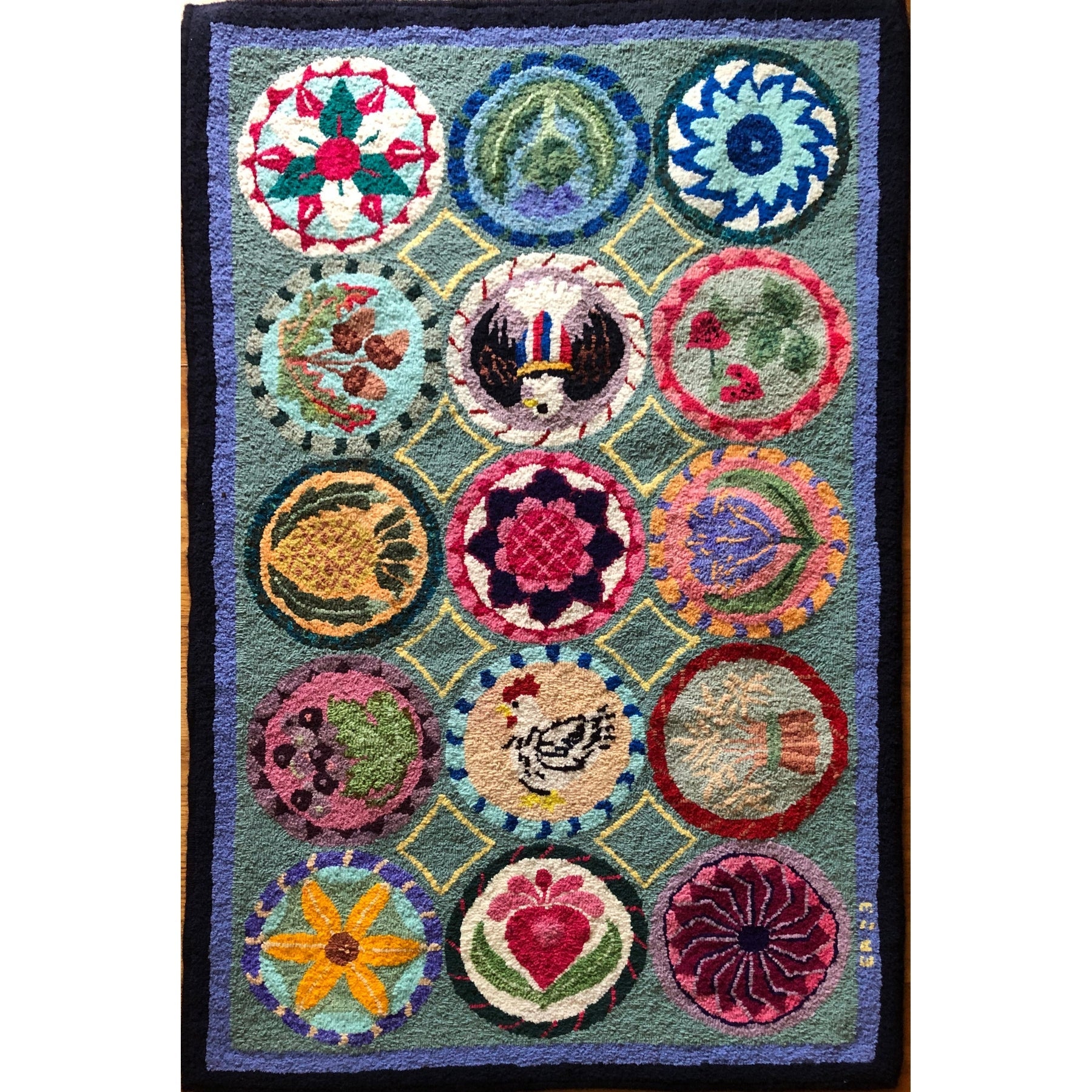 Buttermolds, rug hooked by Ellen Abrams