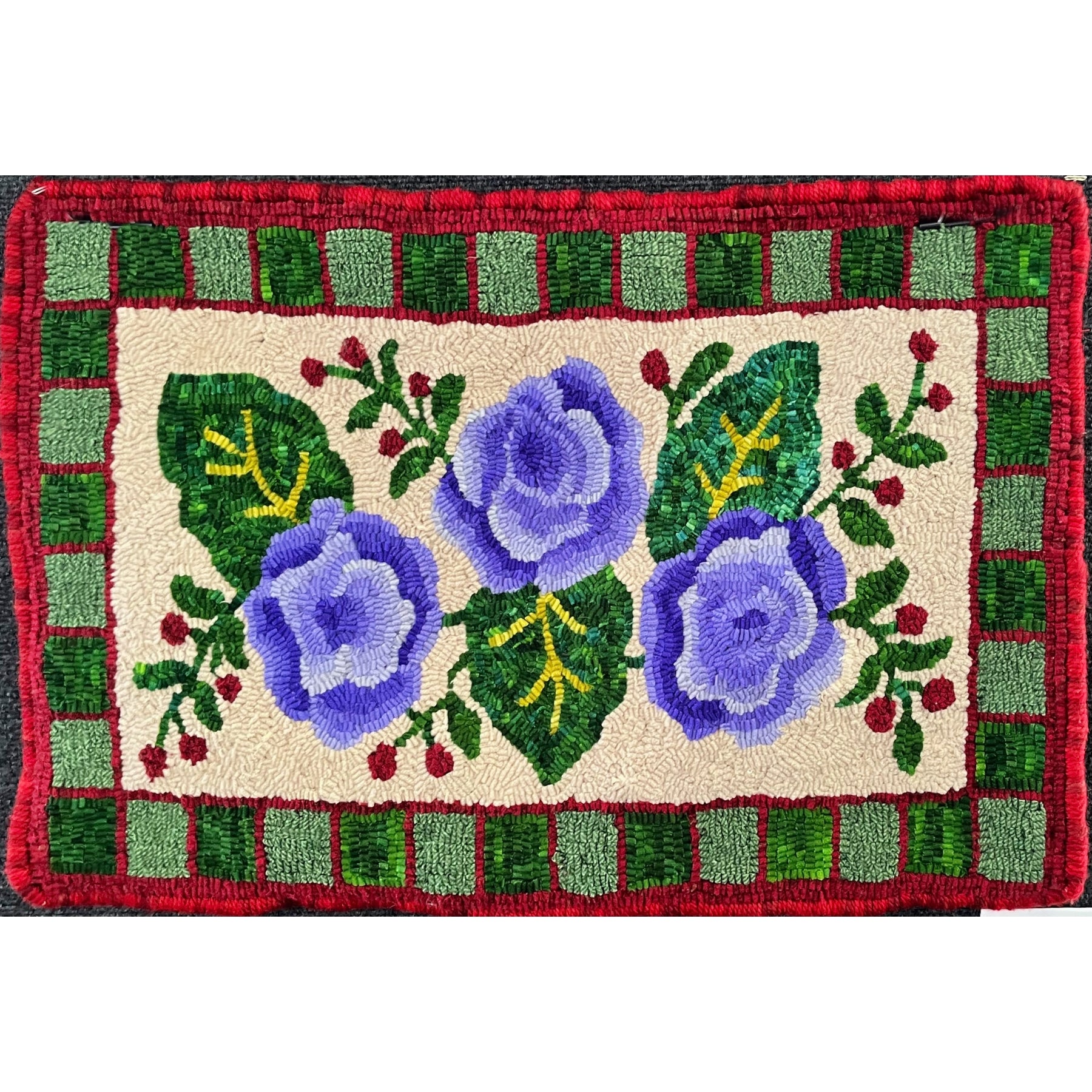 Three Rose Antique, rug hooked by Judy Brown