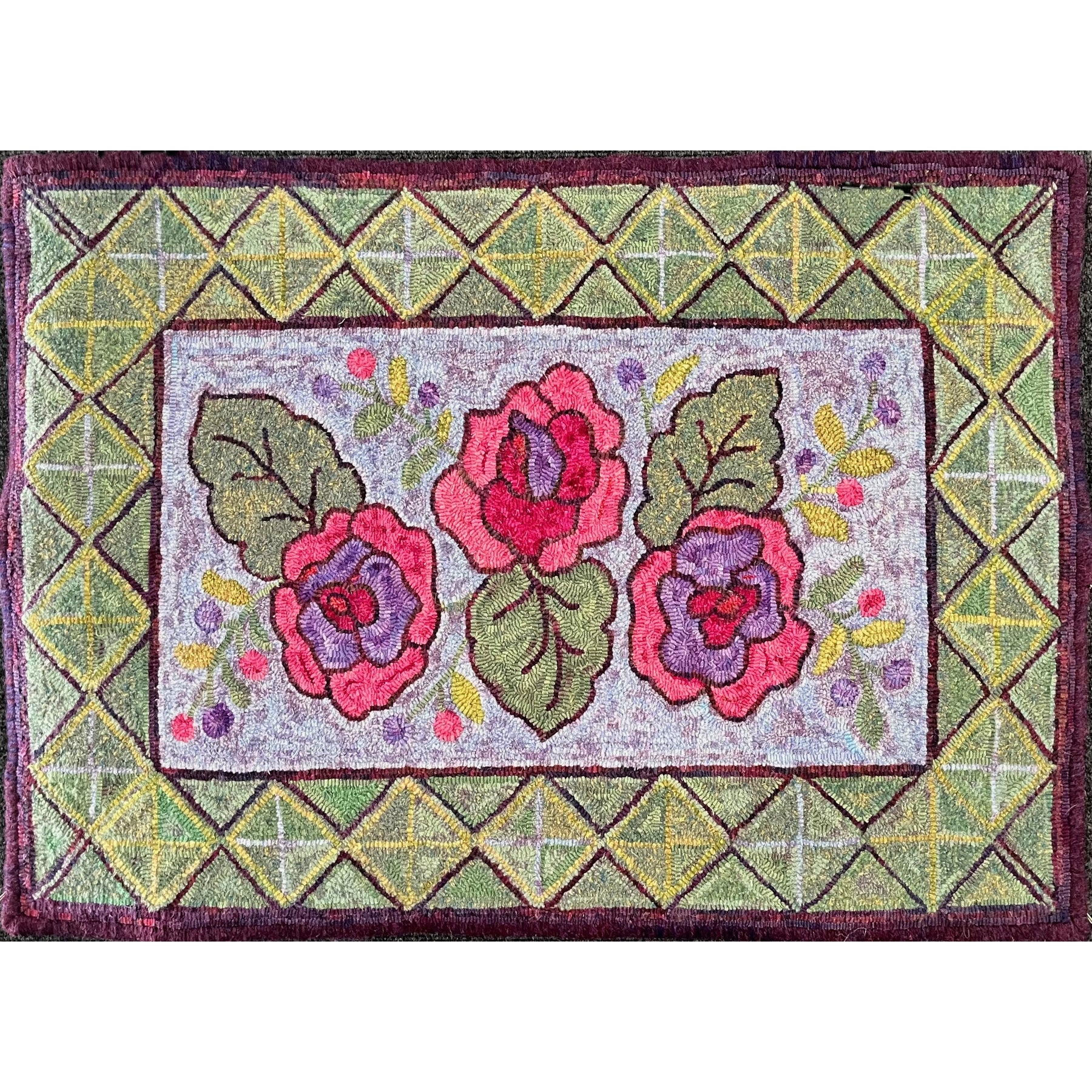 Three Rose Antique, rug hooked by Marty Liptak