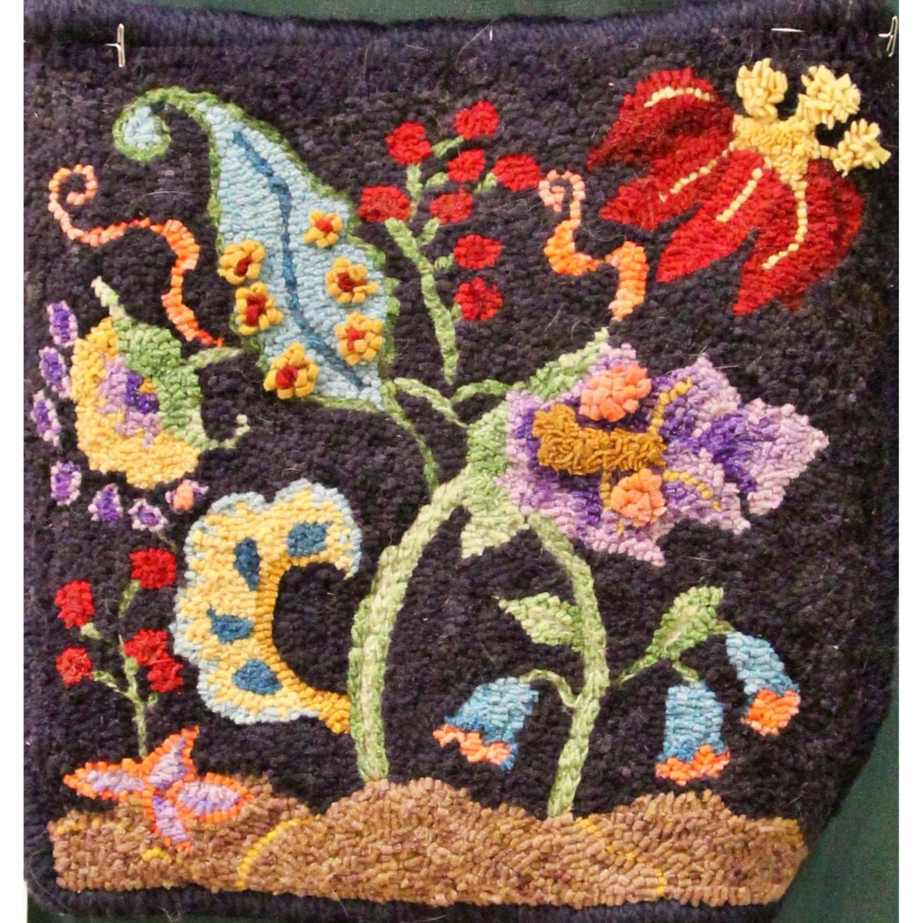 Izette Crewel, rug hooked by Susan Barry