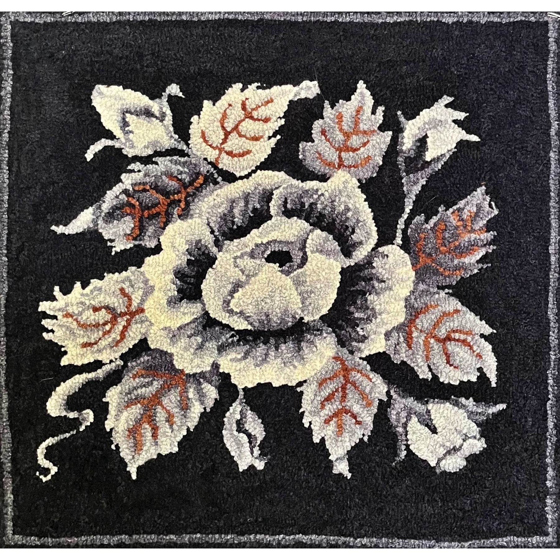 Rose, rug hooked by Chrisrtine Wardrop