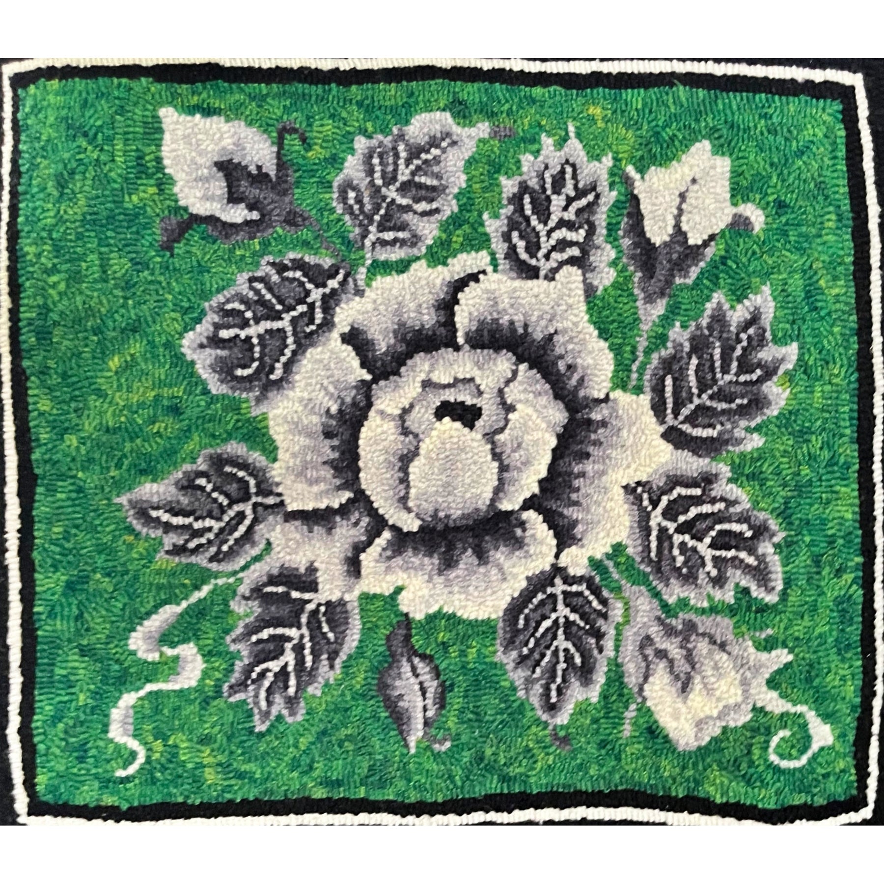 Rose, rug hooked by Rebecca Martin