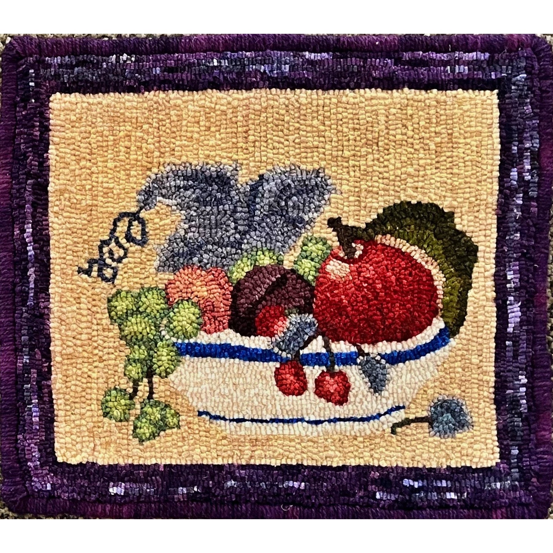 Bowl Of Fruit, rug hooked by Julie Oles