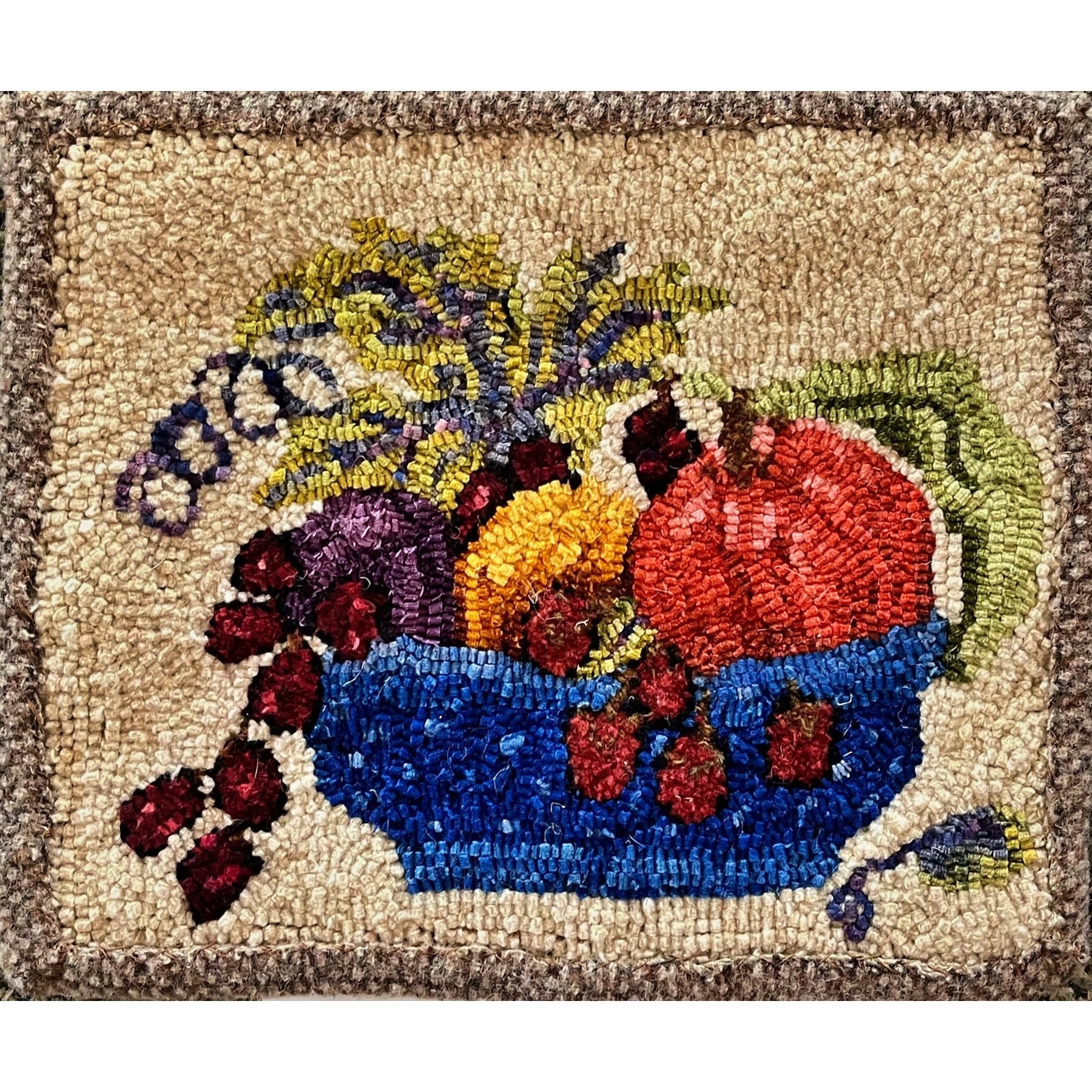 Bowl Of Fruit, rug hooked by Lois Detrich