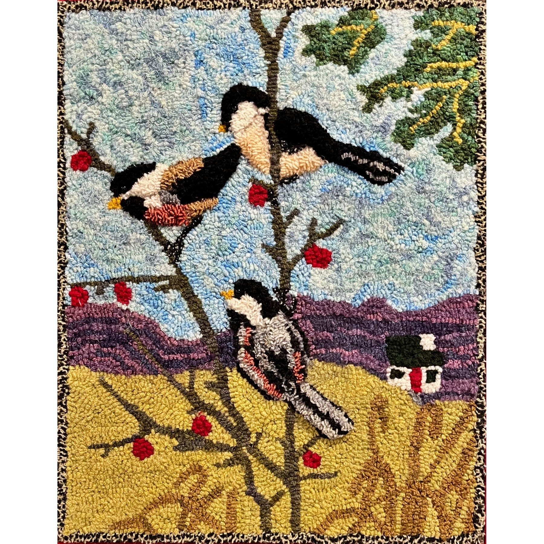 Chickadees, rug hooked by Sue Minorini