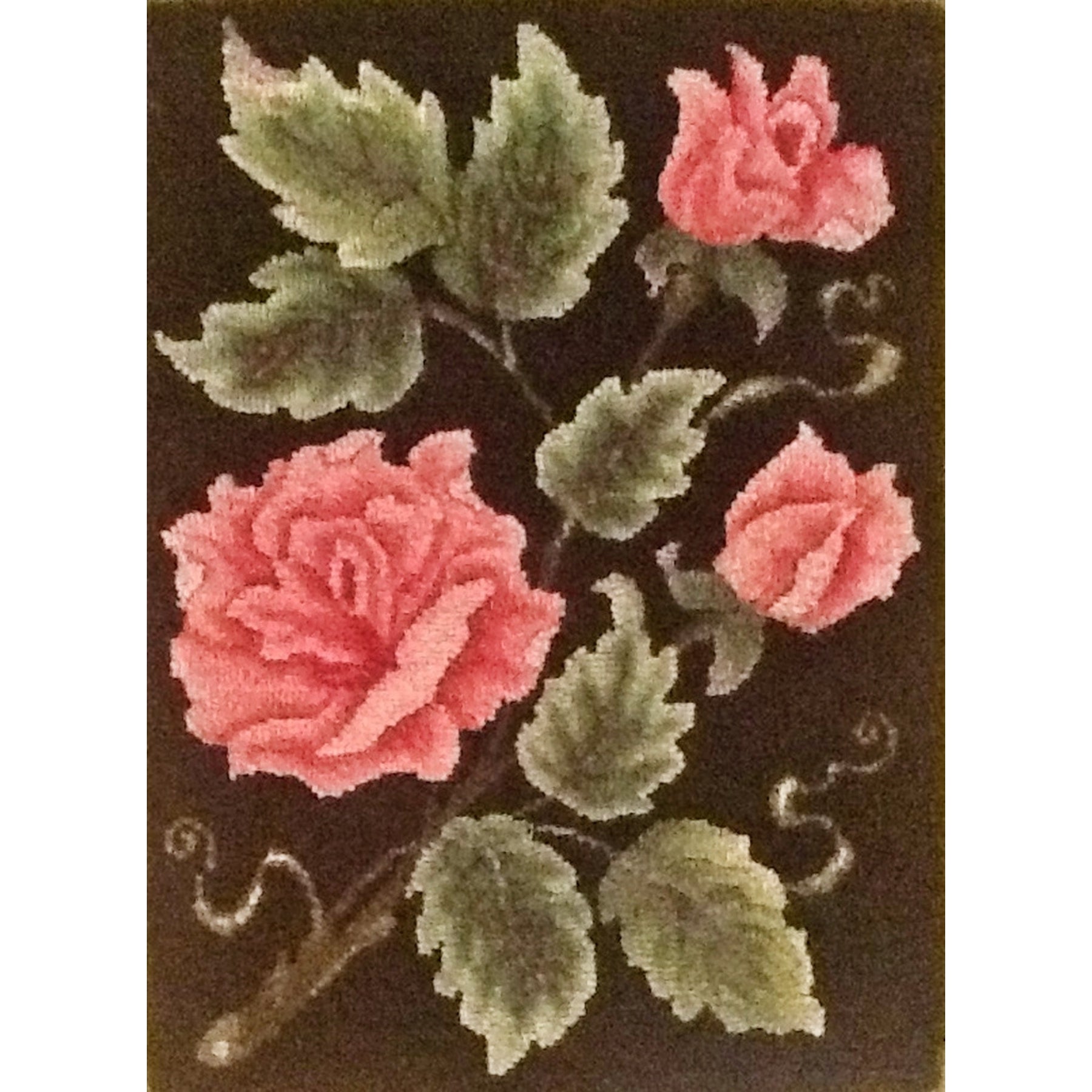 Roses, rug hooked by Erica Decree