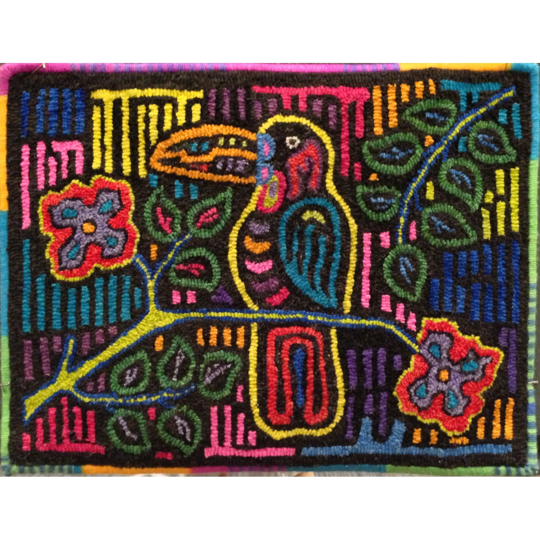 Toucan Mola, rug hooked by Vivily Powers