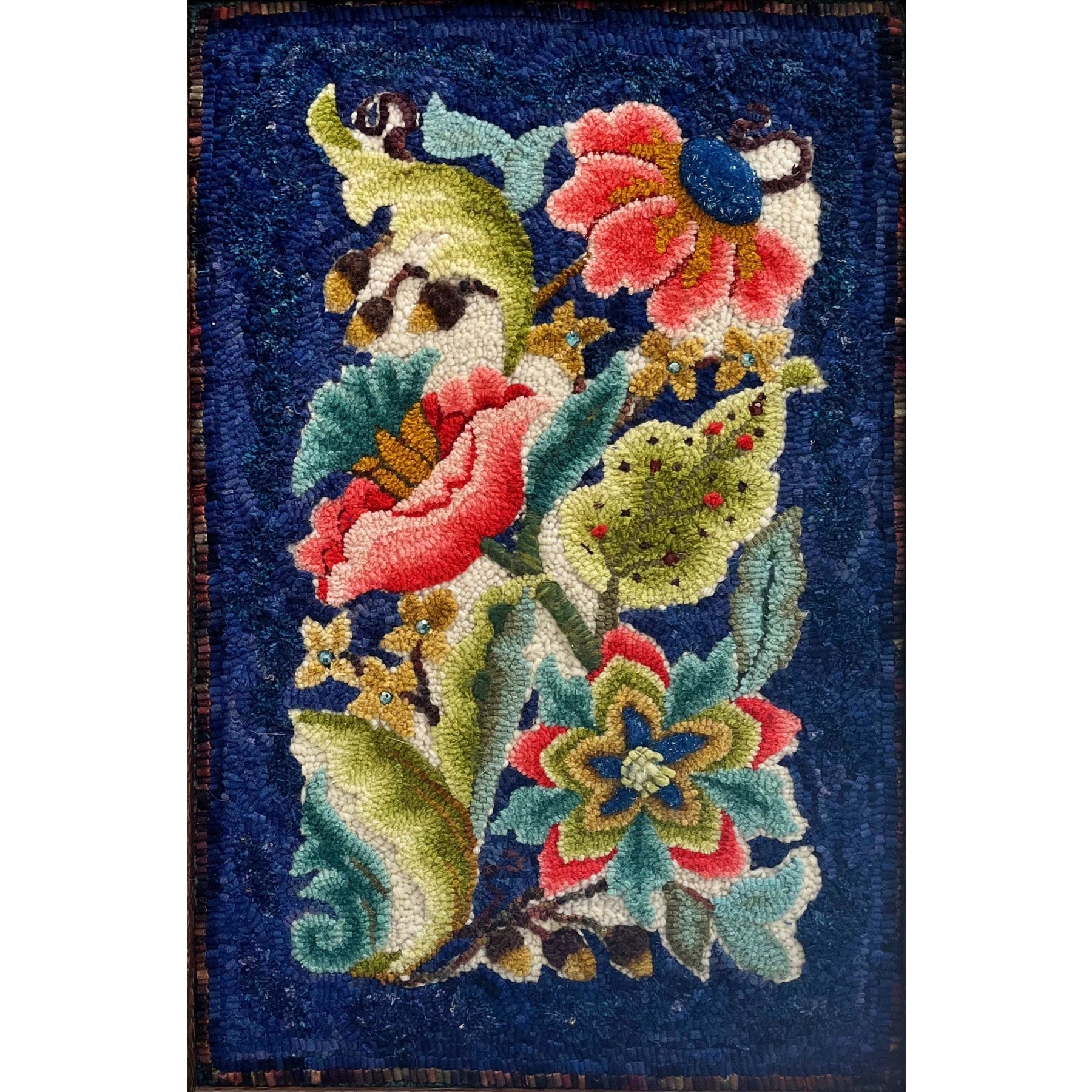 Crewel Desire, rug hooked by Magbis Vizcaino-Green