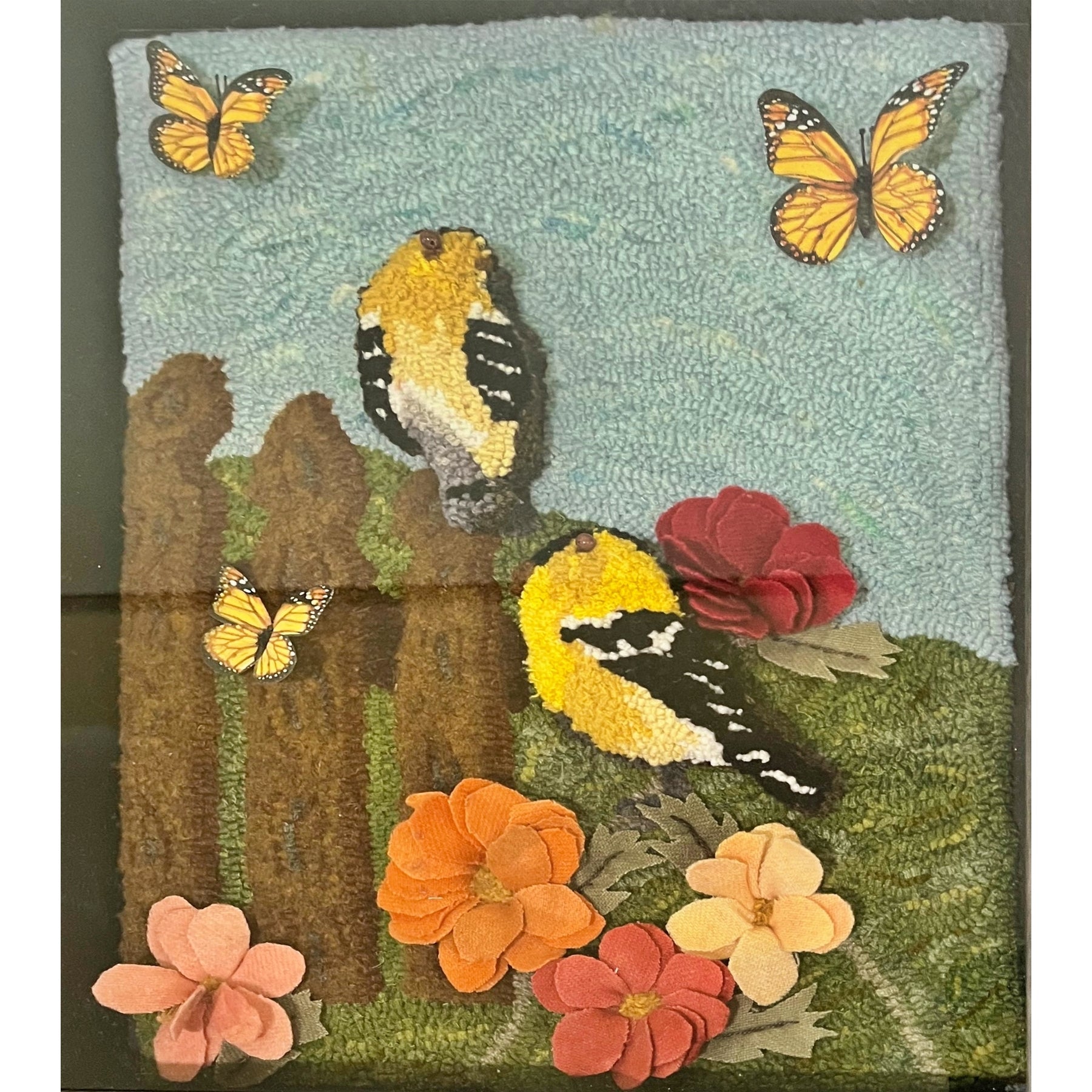 Finches, rug hooked by Rita Wagner