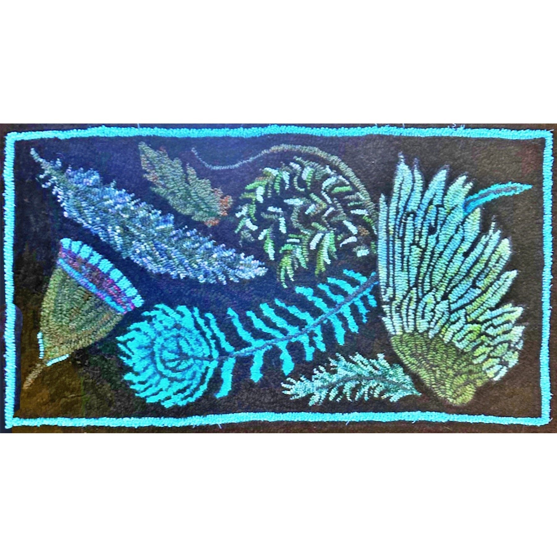 A Feather Sampler, rug hooked by Carole Seftom