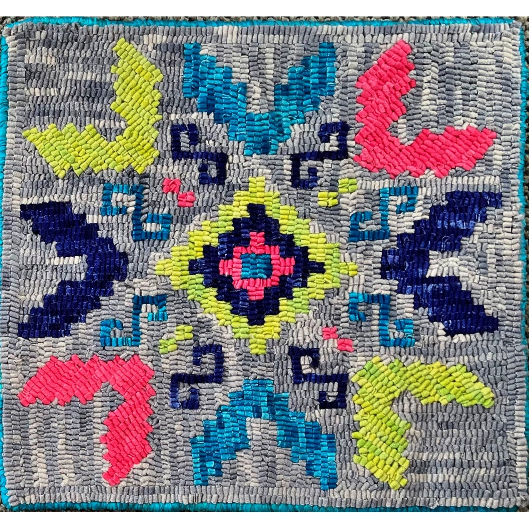 Big Pueblo Weaver, rug hooked by Pat Sims