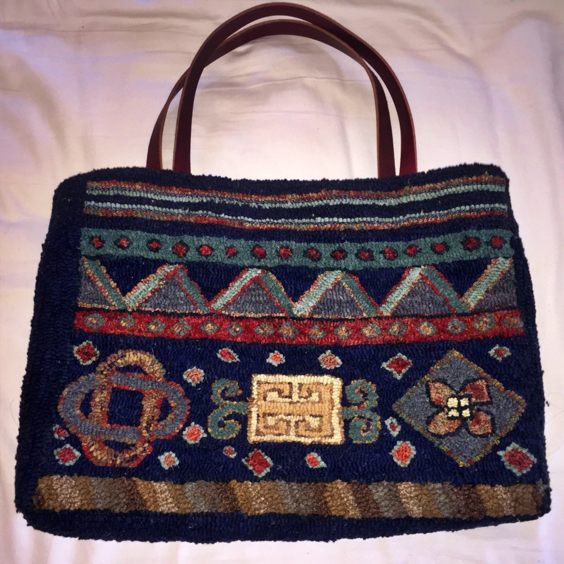 Desert Wanderer Bag, rug hooked by Kathleen McPartlan