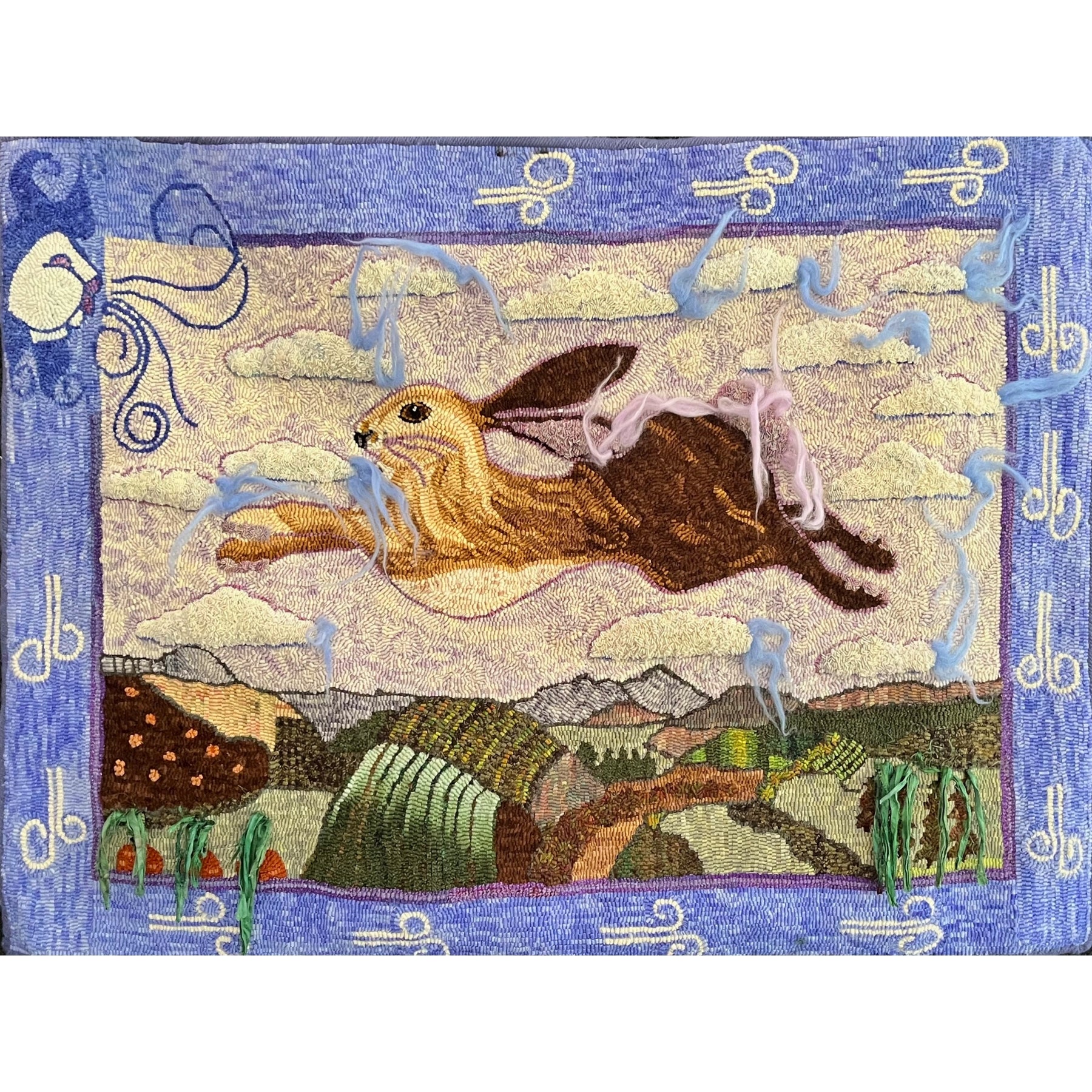 The Flying Hare, rug hooked by Nadine McCann