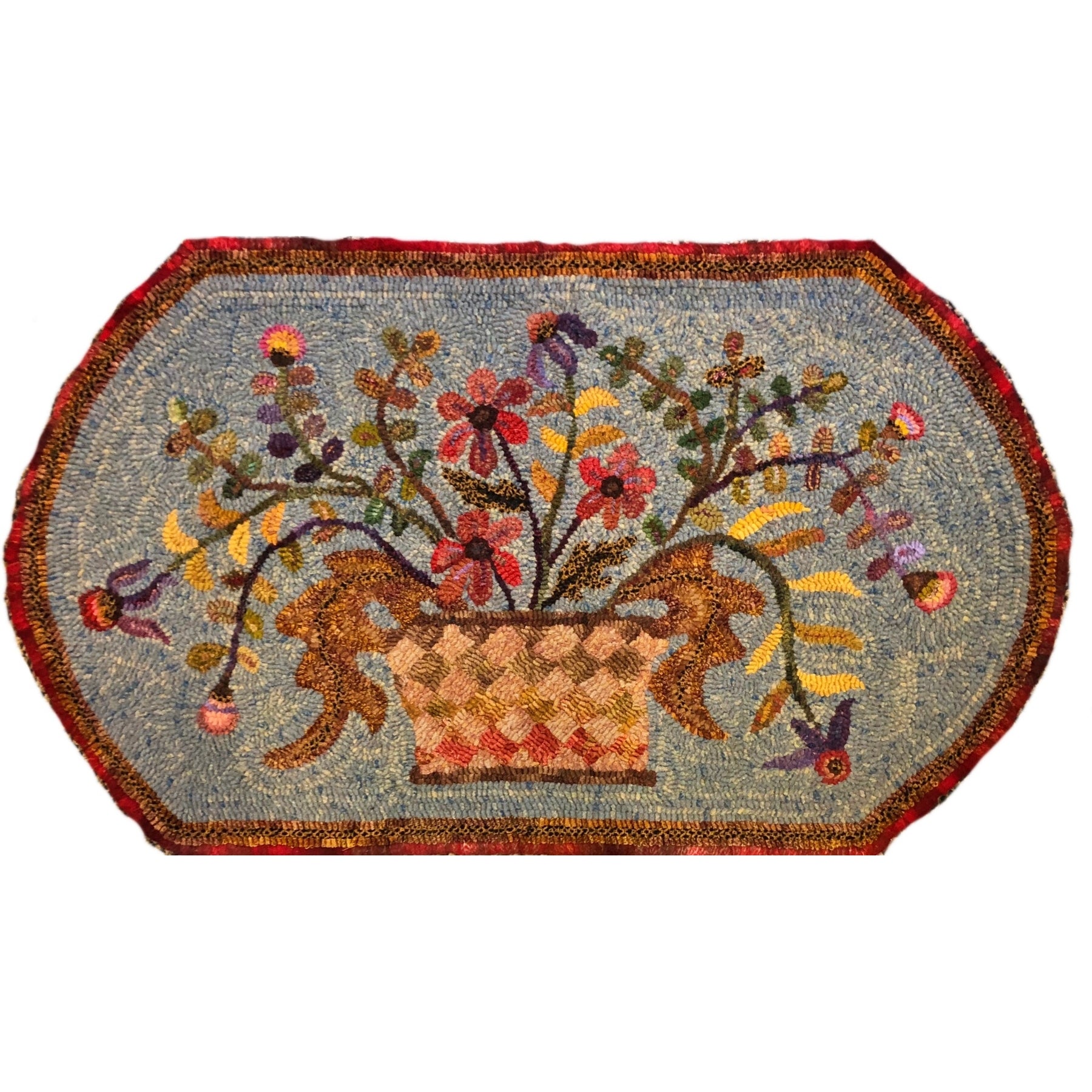 Basket Of Flowers, rug hooked by Terese Macedo