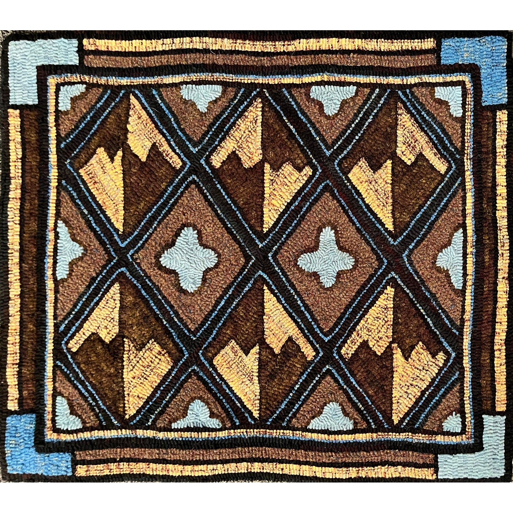 Criss Cross, rug hooked by Mary McGrath