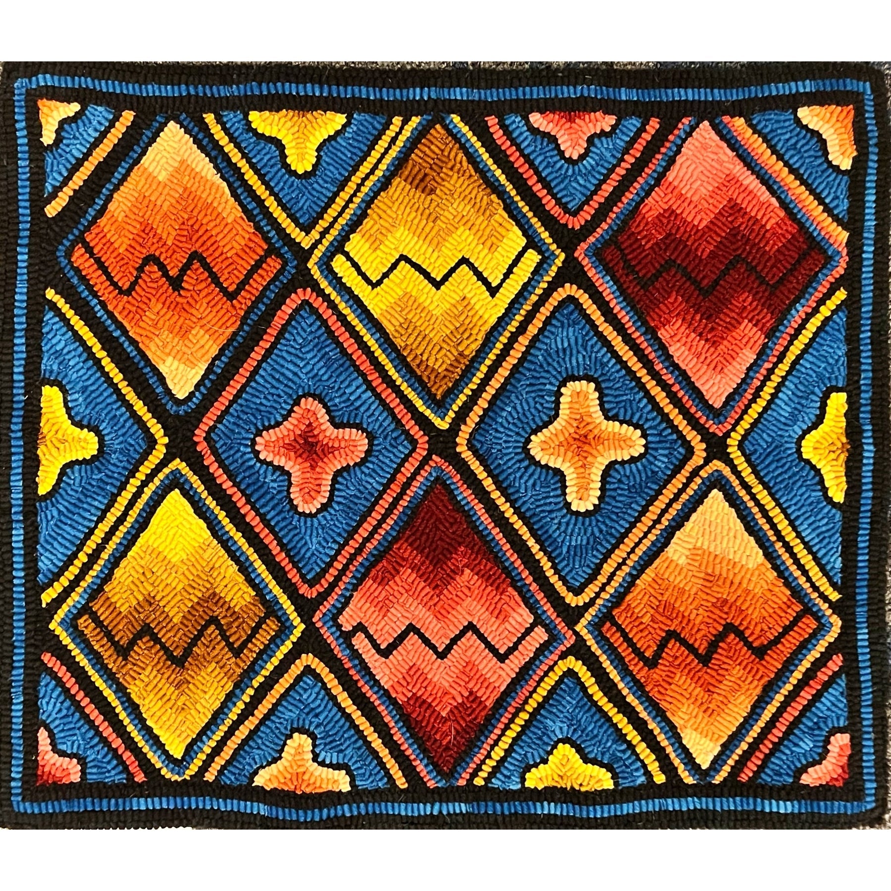 Criss Cross, rug hooked by Mary McGrath