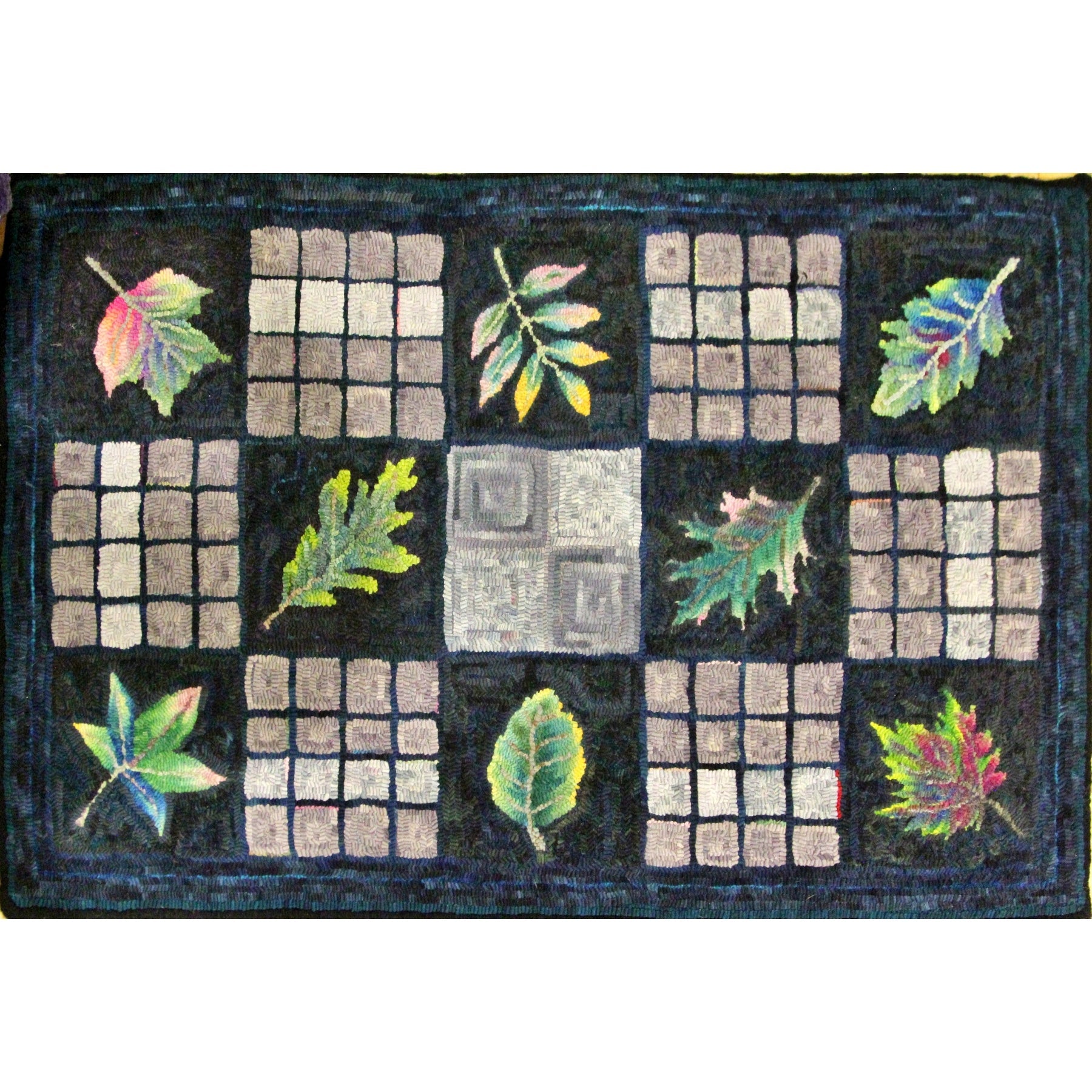 Leaf Sampler, rug hooked by Marty Liptak