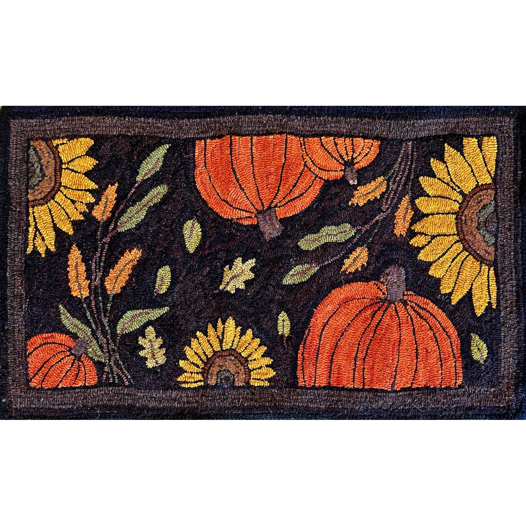 Thanksgiving, rug hooked by Sheri Matz