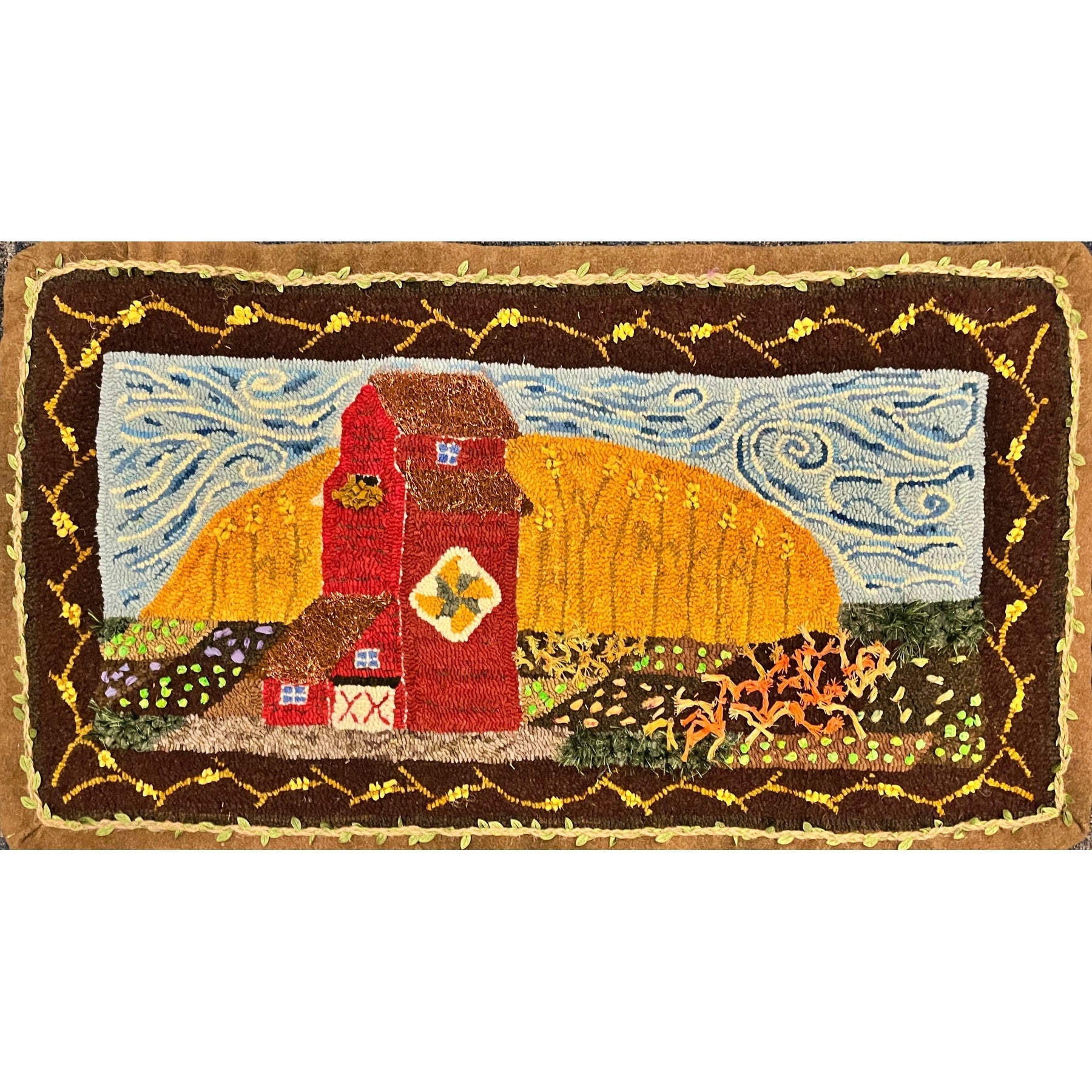 Hope Springs Eternal, rug hooked by Rita Wagner