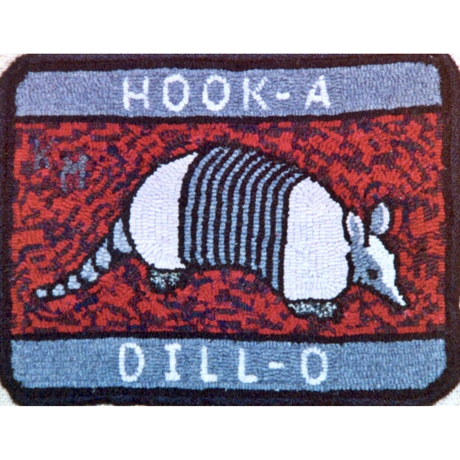 Armadillo, rug hooked by Karen Maddox