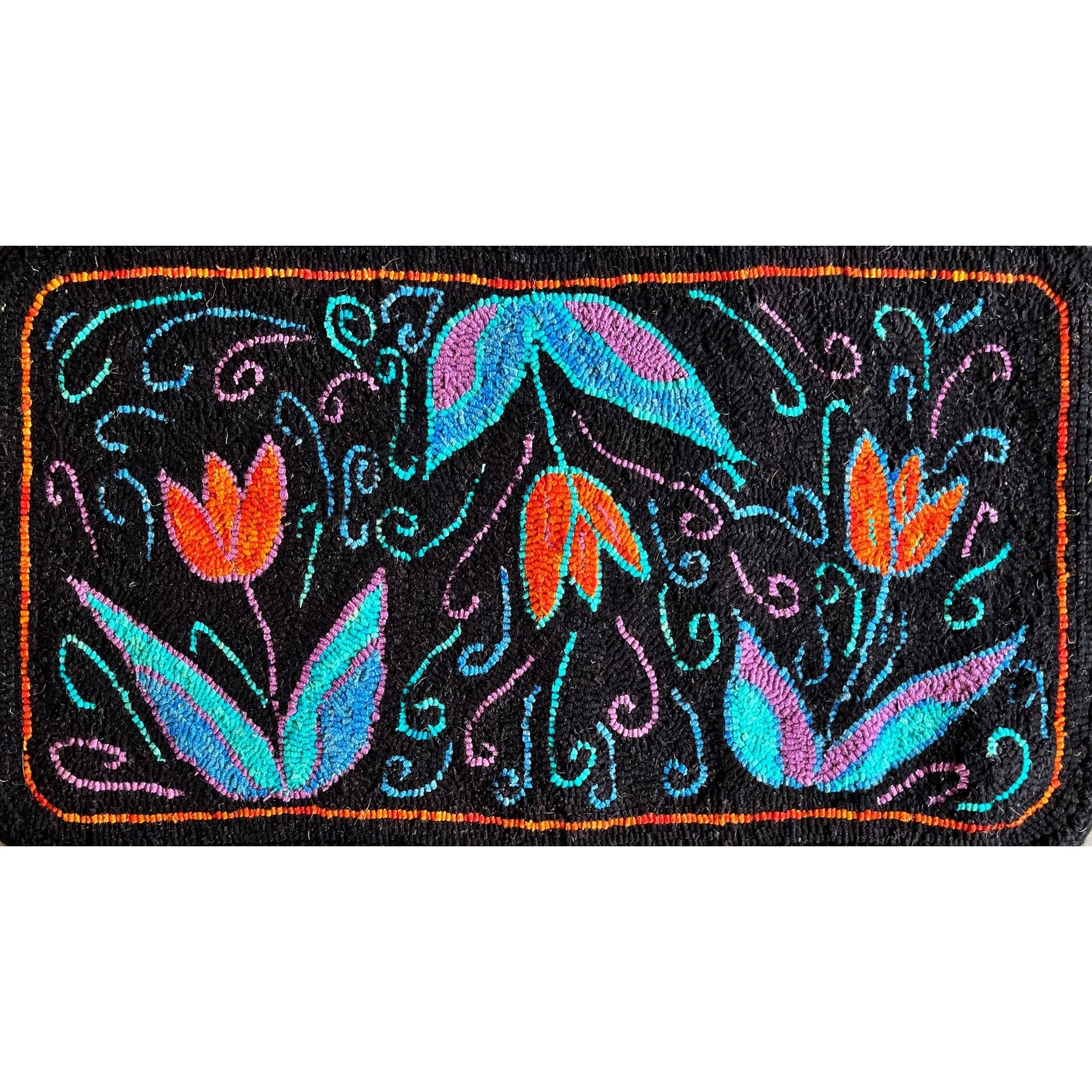 Tulips, rug hooked by Sheri Matz