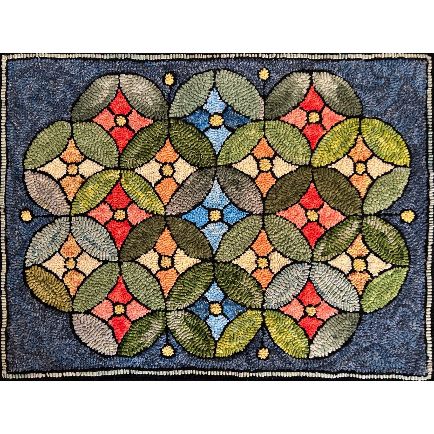 Cathedral Window Circles, rug hooked by Mary O'Donnell