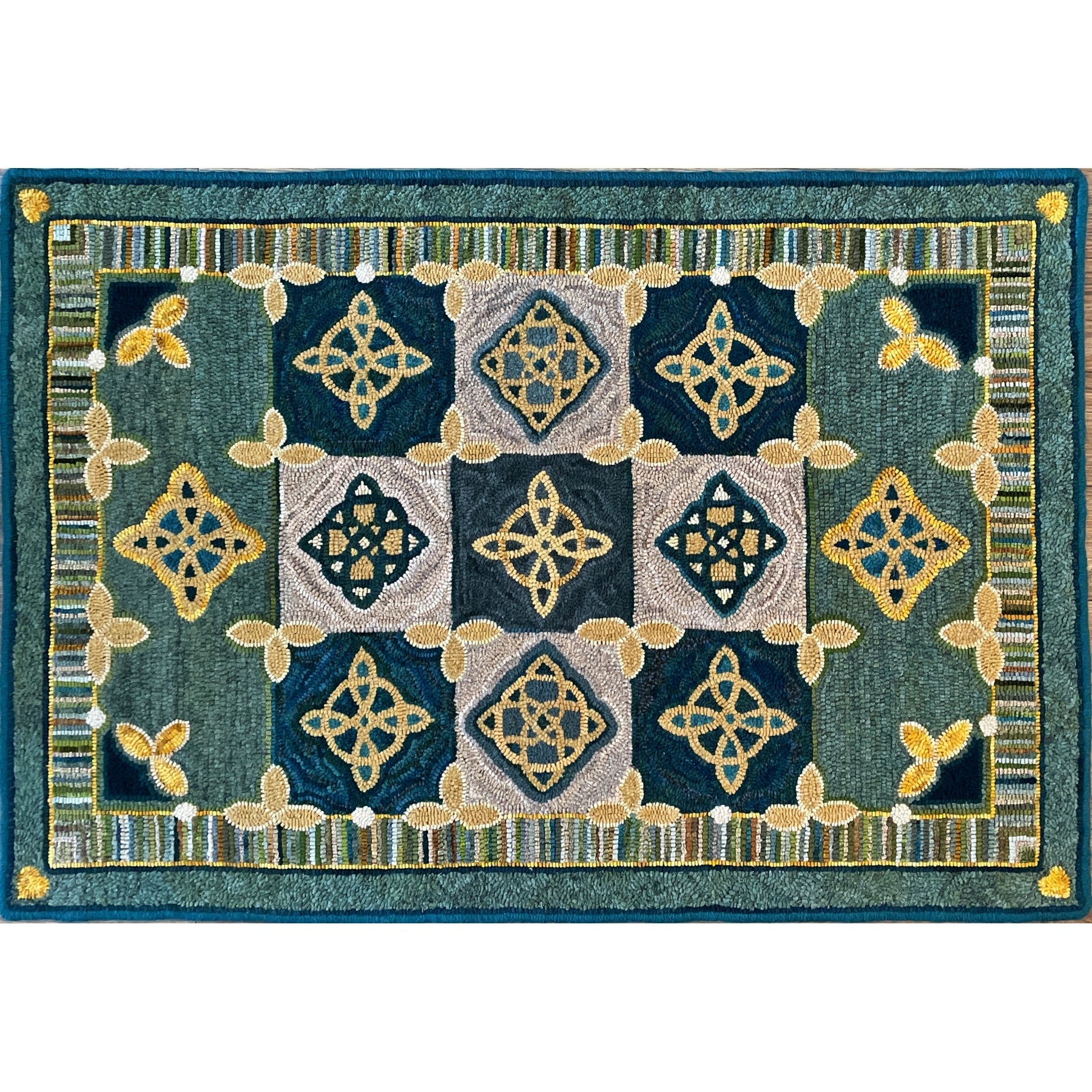 Celtic Dance, rug hooked by Mary O'Donnell