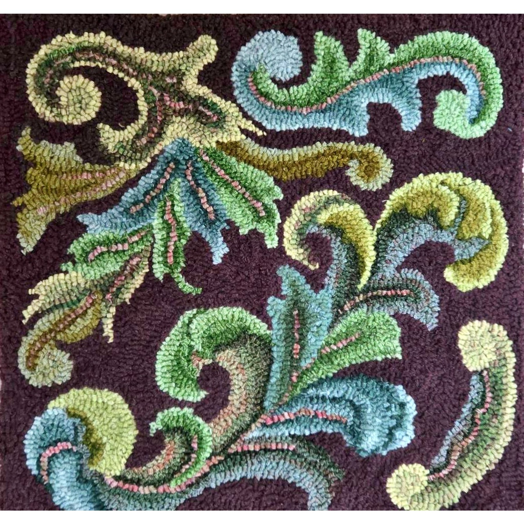 Scrolls, rug hooked by Kathie Yancey