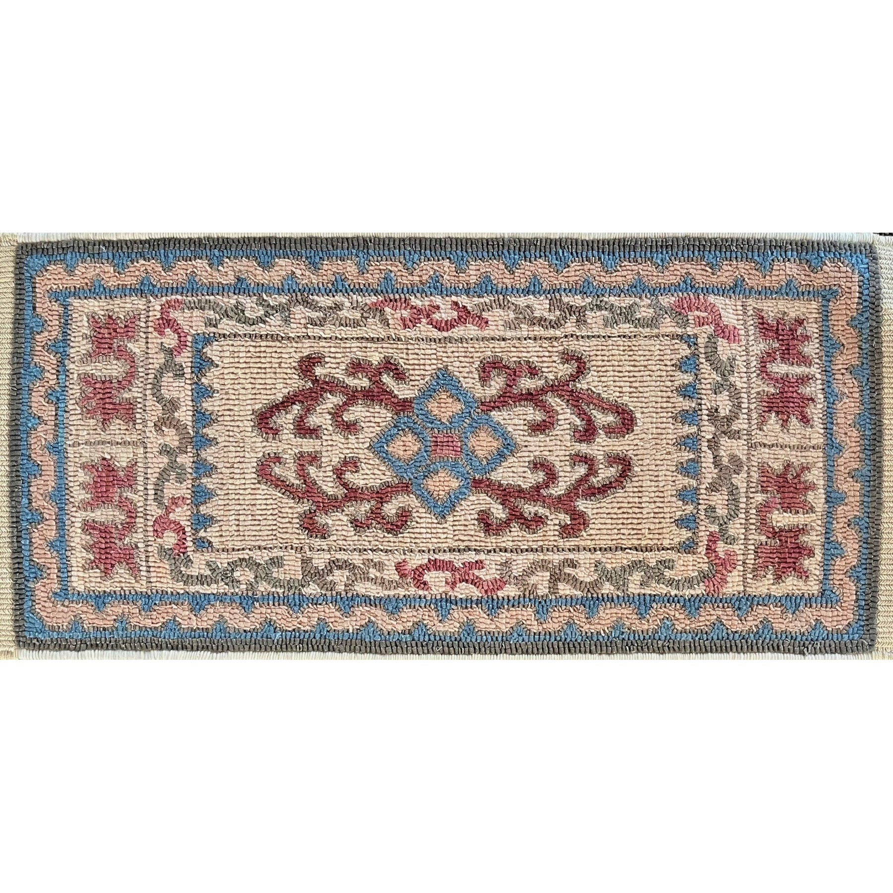 Maltese Magic, rug hooked by Catherine Lockwood